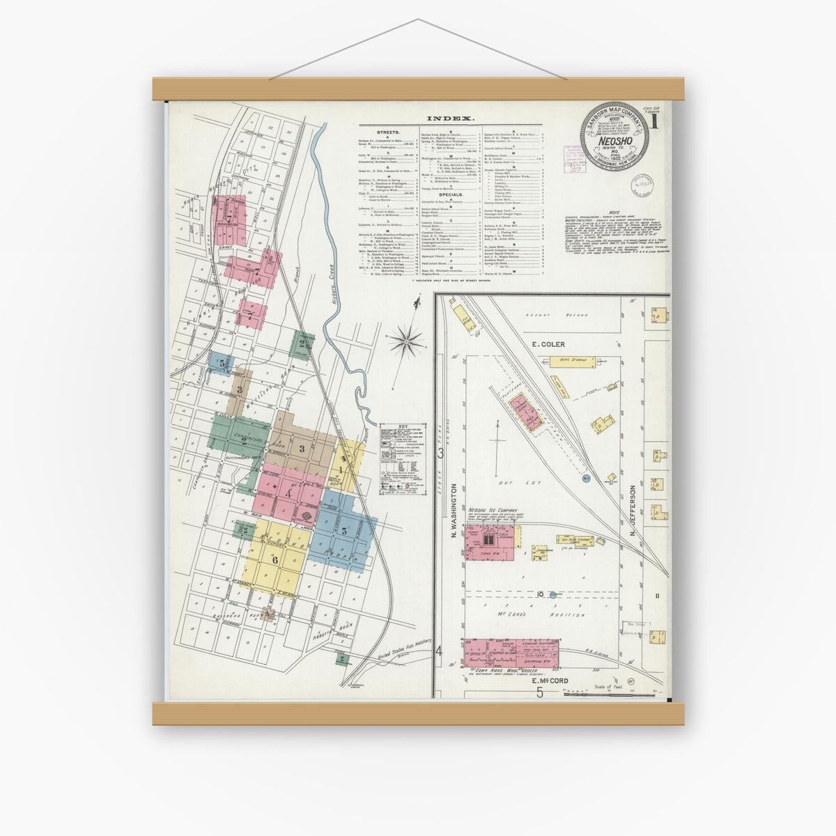 Old map wall art mockup — magnetic wood frame on white wall — Sanborn Fire Insurance Map from Neosho, Newton County, Missouri (1902) - Complete Map Set