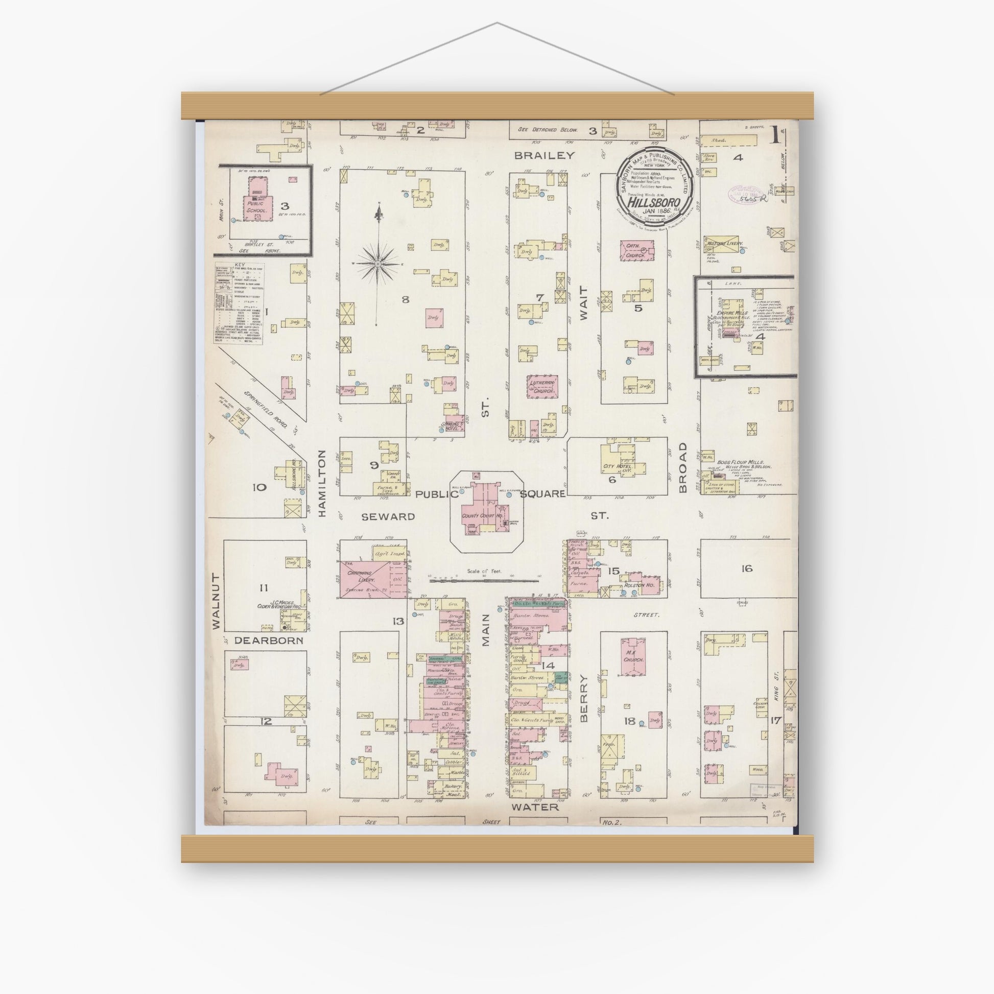 Old map wall art mockup — magnetic wood frame on white wall — Sanborn Fire Insurance Map from Hillsboro, Montgomery County, Illinois (1886) - Complete Map Set