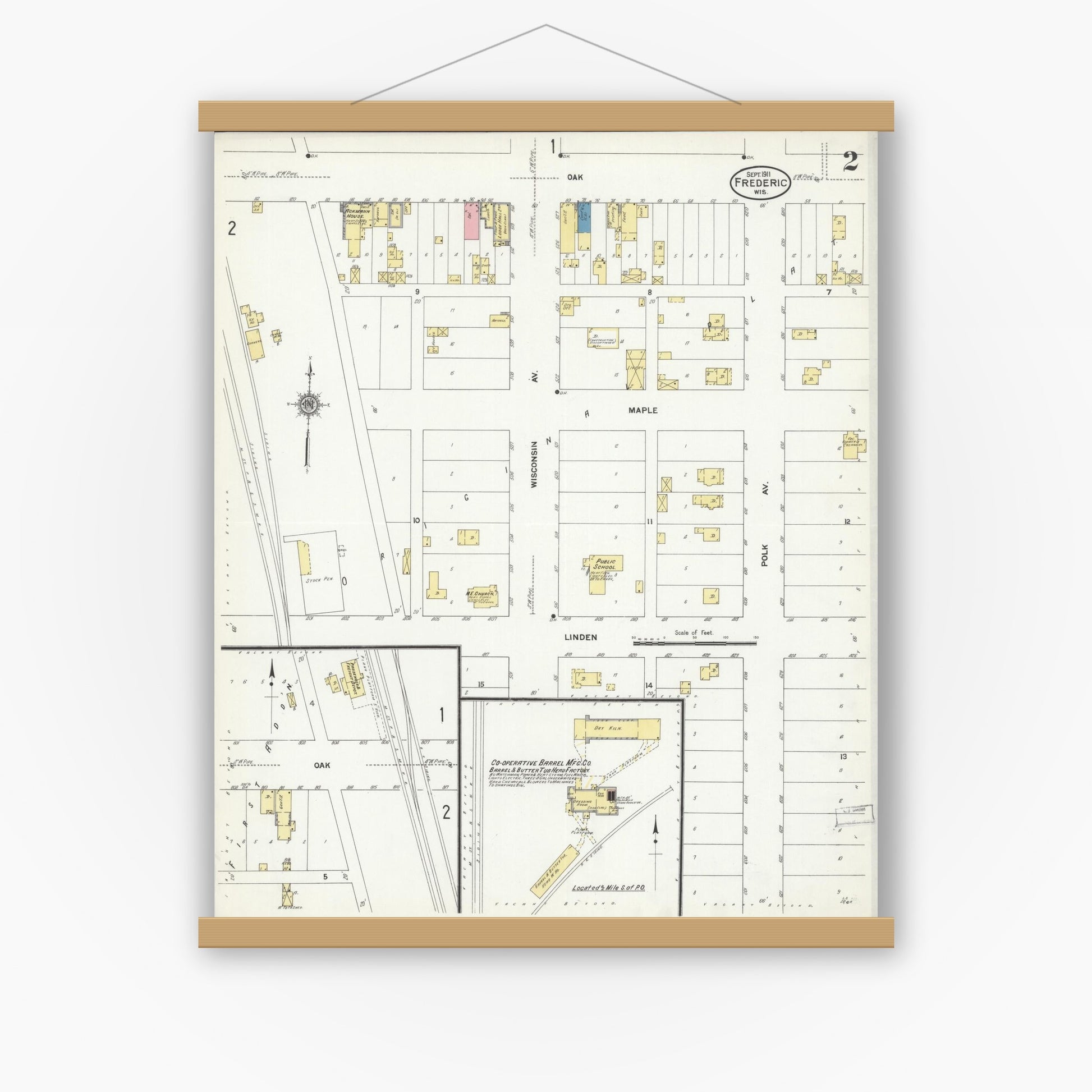 Old map wall art mockup — magnetic wood frame on white wall — Sanborn Fire Insurance Map from Frederic, Polk County, Wisconsin (1911), Sheet #0002
