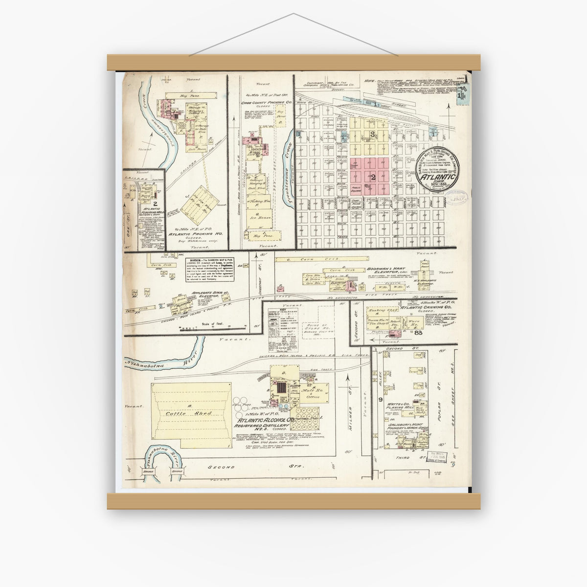 Old map wall art mockup — magnetic wood frame on white wall — Sanborn Fire Insurance Map from Atlantic, Cass County, Iowa (1883), Sheet #0001