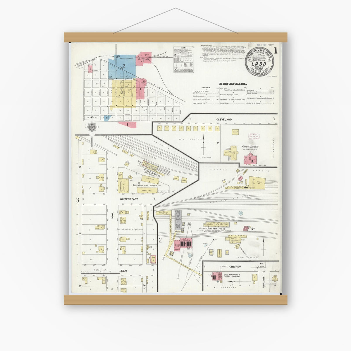 Old map wall art mockup — magnetic wood frame on white wall — Sanborn Fire Insurance Map from Ladd, Bureau County, Illinois (1911), Sheet #0001