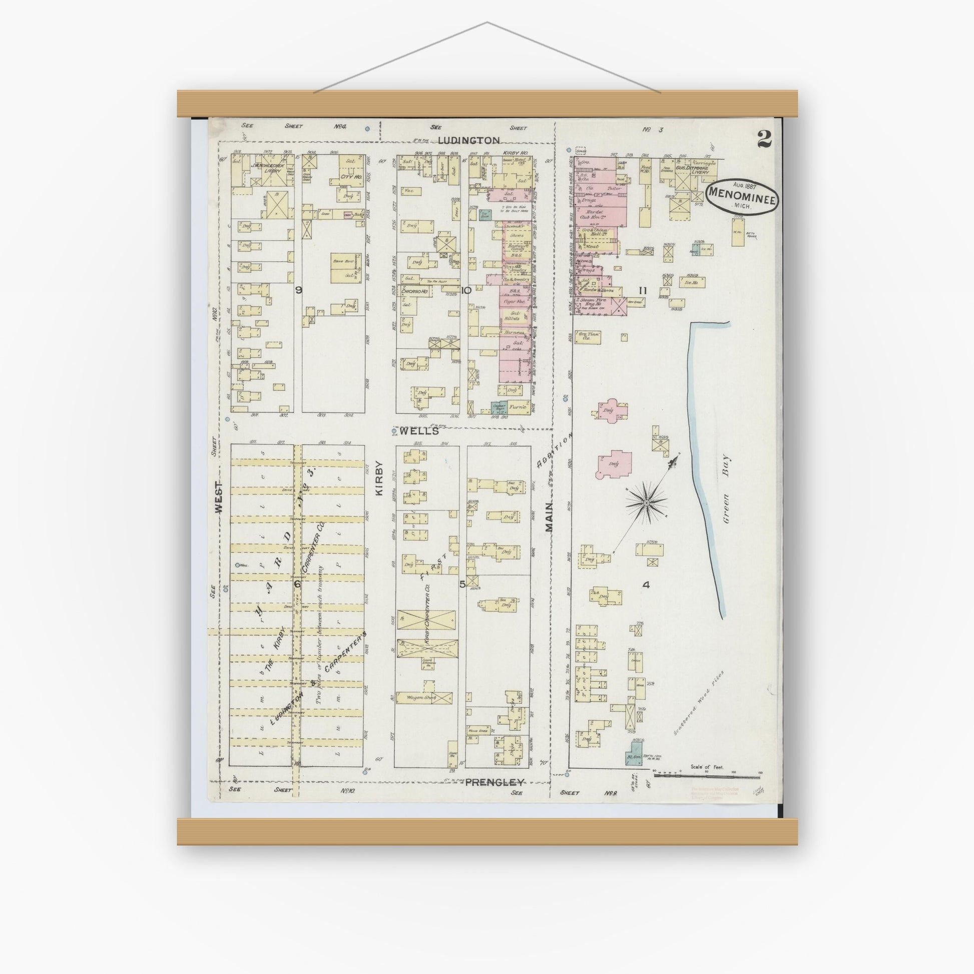 Old map wall art mockup — magnetic wood frame on white wall — Sanborn Fire Insurance Map from Menominee, Menominee County, Michigan (1887), Sheet #0002