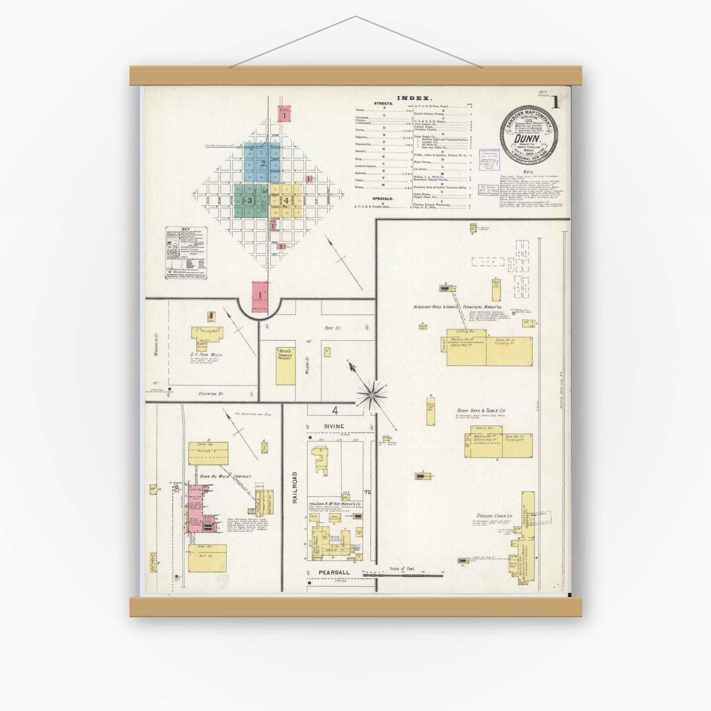 Old map wall art mockup — magnetic wood frame on white wall — Sanborn Fire Insurance Map from Dunn, Harnett County, North Carolina (1904) - Complete Map Set