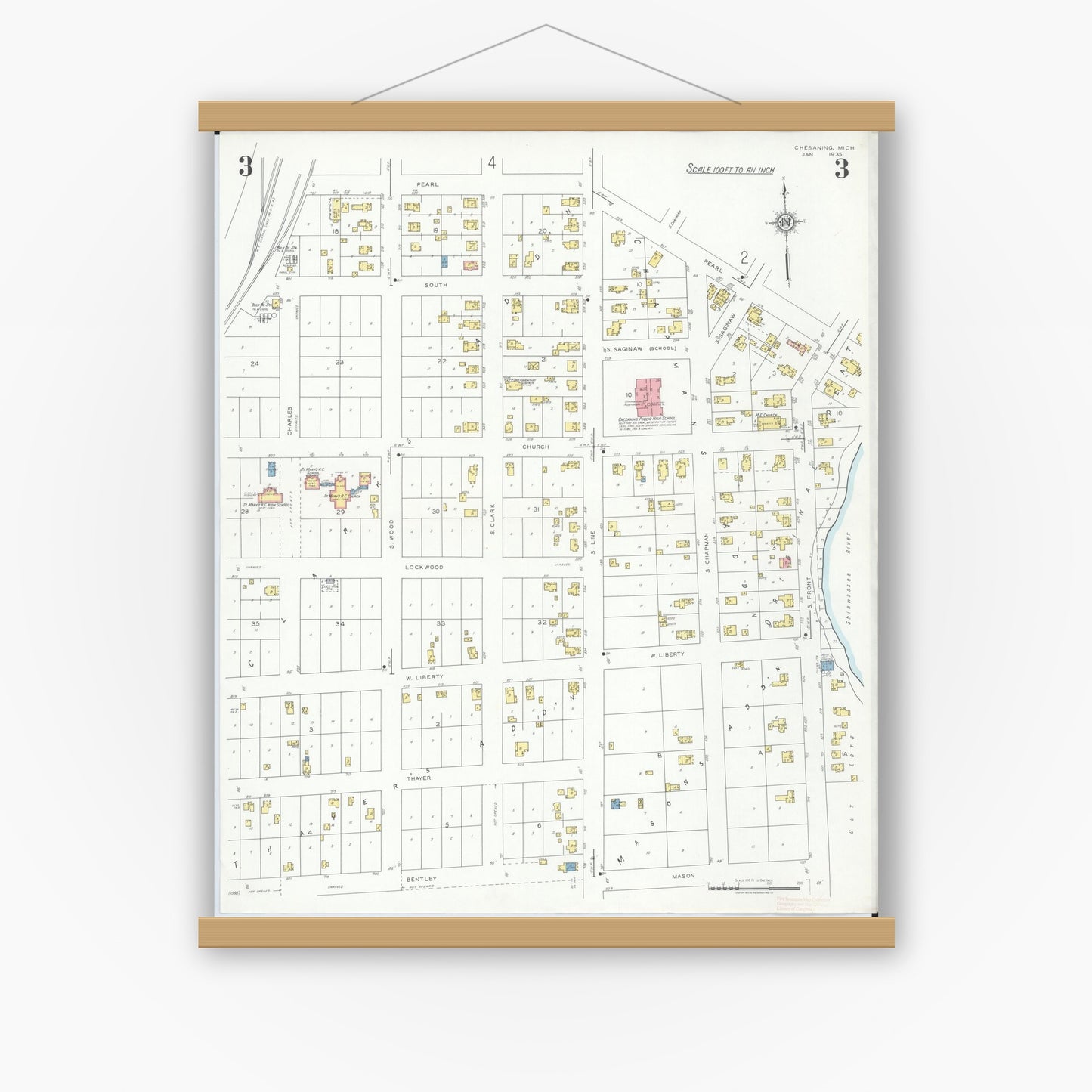 Old map wall art mockup — magnetic wood frame on white wall — Sanborn Fire Insurance Map from Chesaning, Saginaw County, Michigan (1935), Sheet #0003