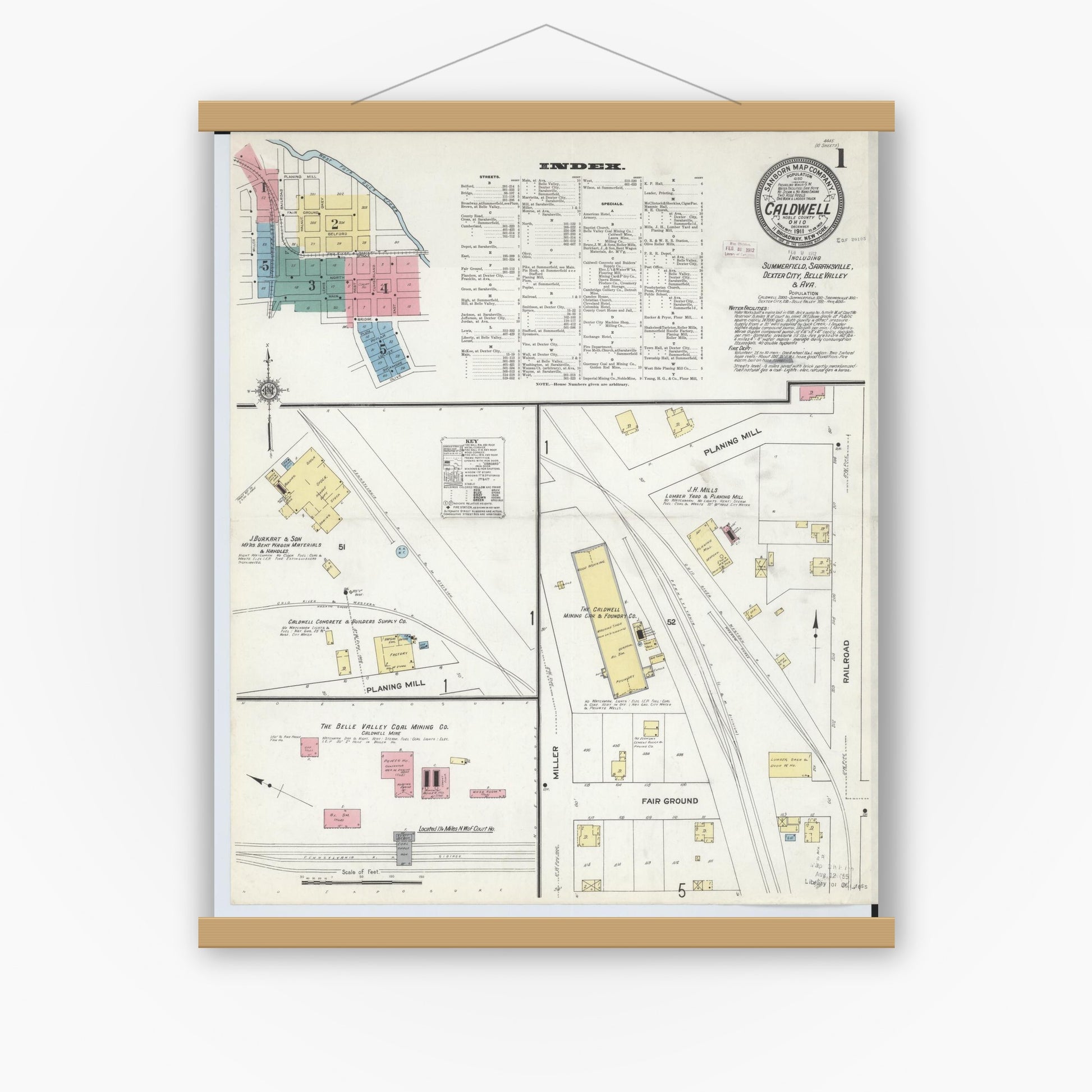 Old map wall art mockup — magnetic wood frame on white wall — Sanborn Fire Insurance Map from Caldwell, Noble County, Ohio (1911), Sheet #0001