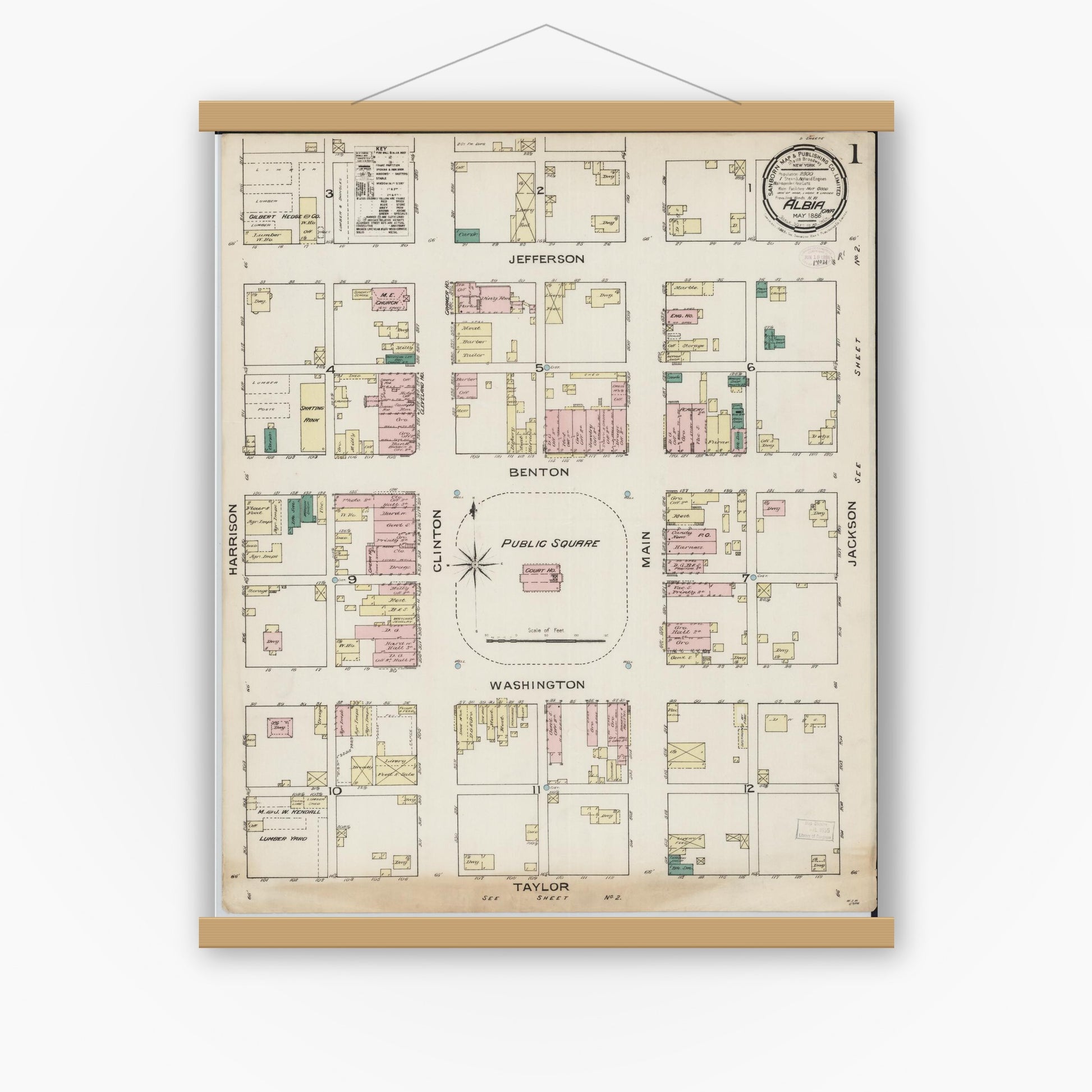 Old map wall art mockup — magnetic wood frame on white wall — Sanborn Fire Insurance Map from Albia, Monroe County, Iowa (1886), Sheet #0001