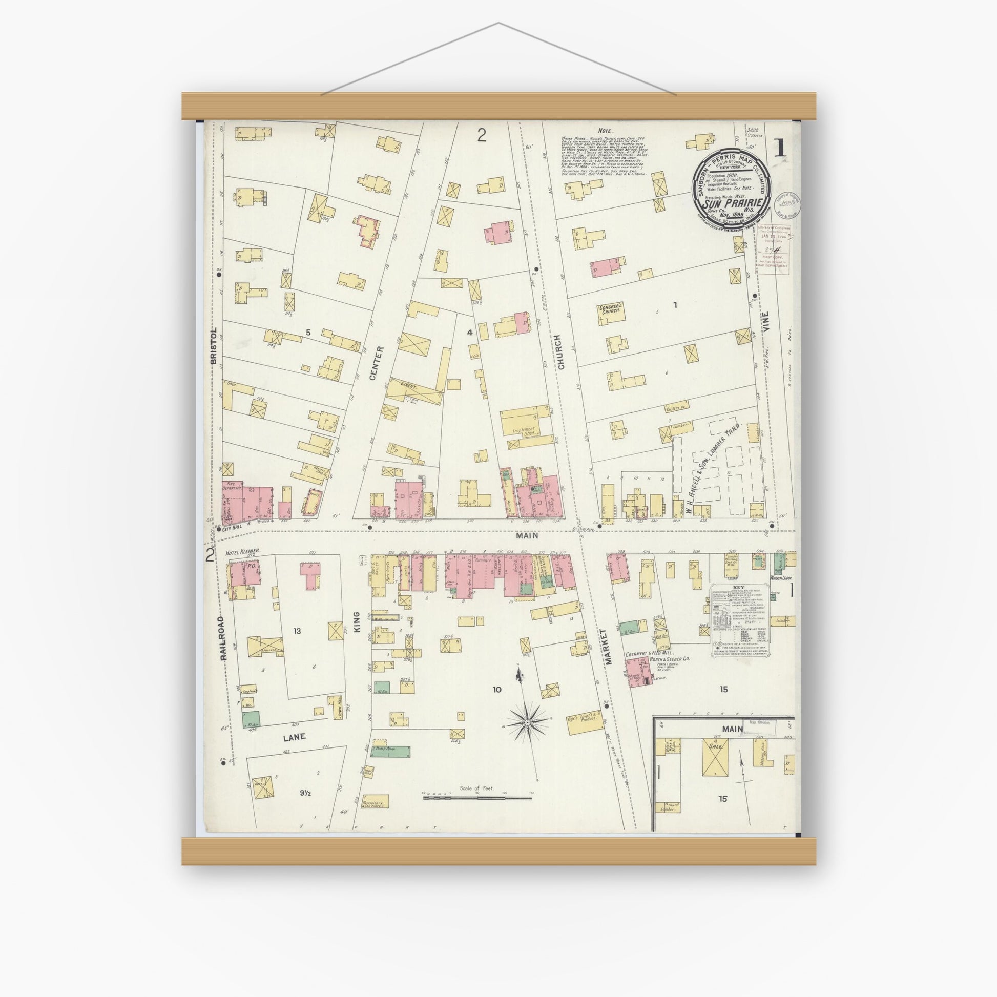 Old map wall art mockup — magnetic wood frame on white wall — Sanborn Fire Insurance Map from Sun Prairie, Dane County, Wisconsin (1899), Sheet #0001