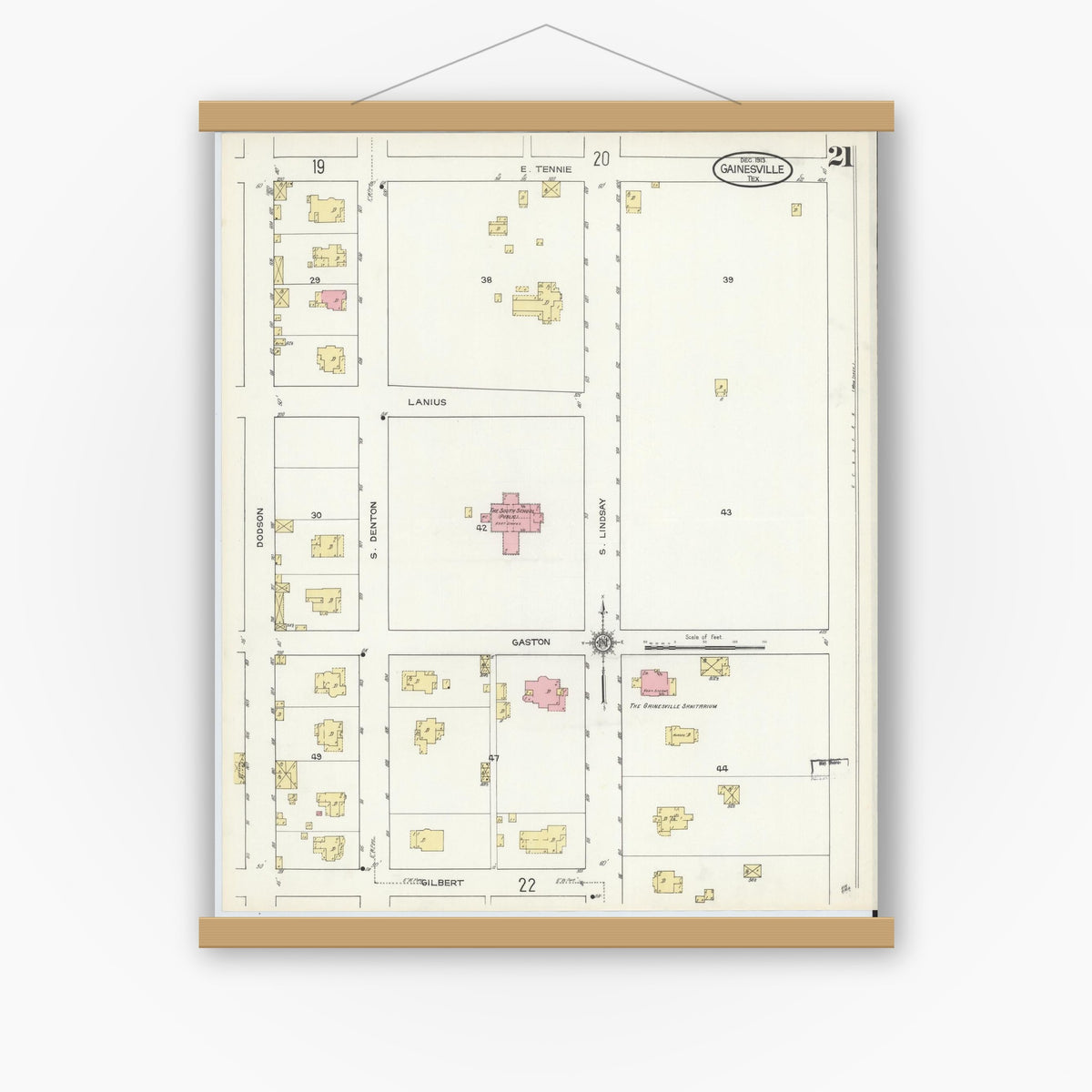 Old map wall art mockup — magnetic wood frame on white wall — Sanborn Fire Insurance Map from Gainesville, Cooke County, Texas (1913), Sheet #0021