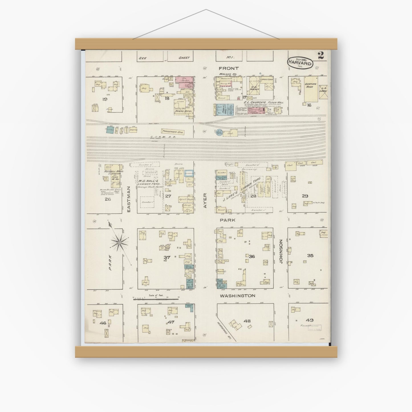Old map wall art mockup — magnetic wood frame on white wall — Sanborn Fire Insurance Map from Harvard, McHenry County, Illinois (1885), Sheet #0002
