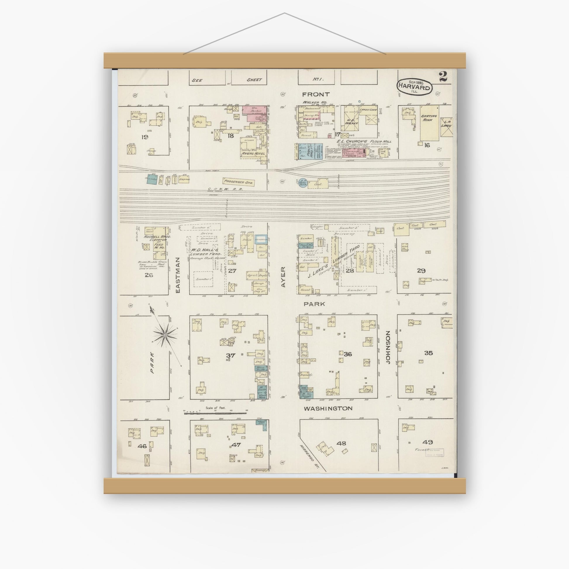 Old map wall art mockup — magnetic wood frame on white wall — Sanborn Fire Insurance Map from Harvard, McHenry County, Illinois (1885), Sheet #0002