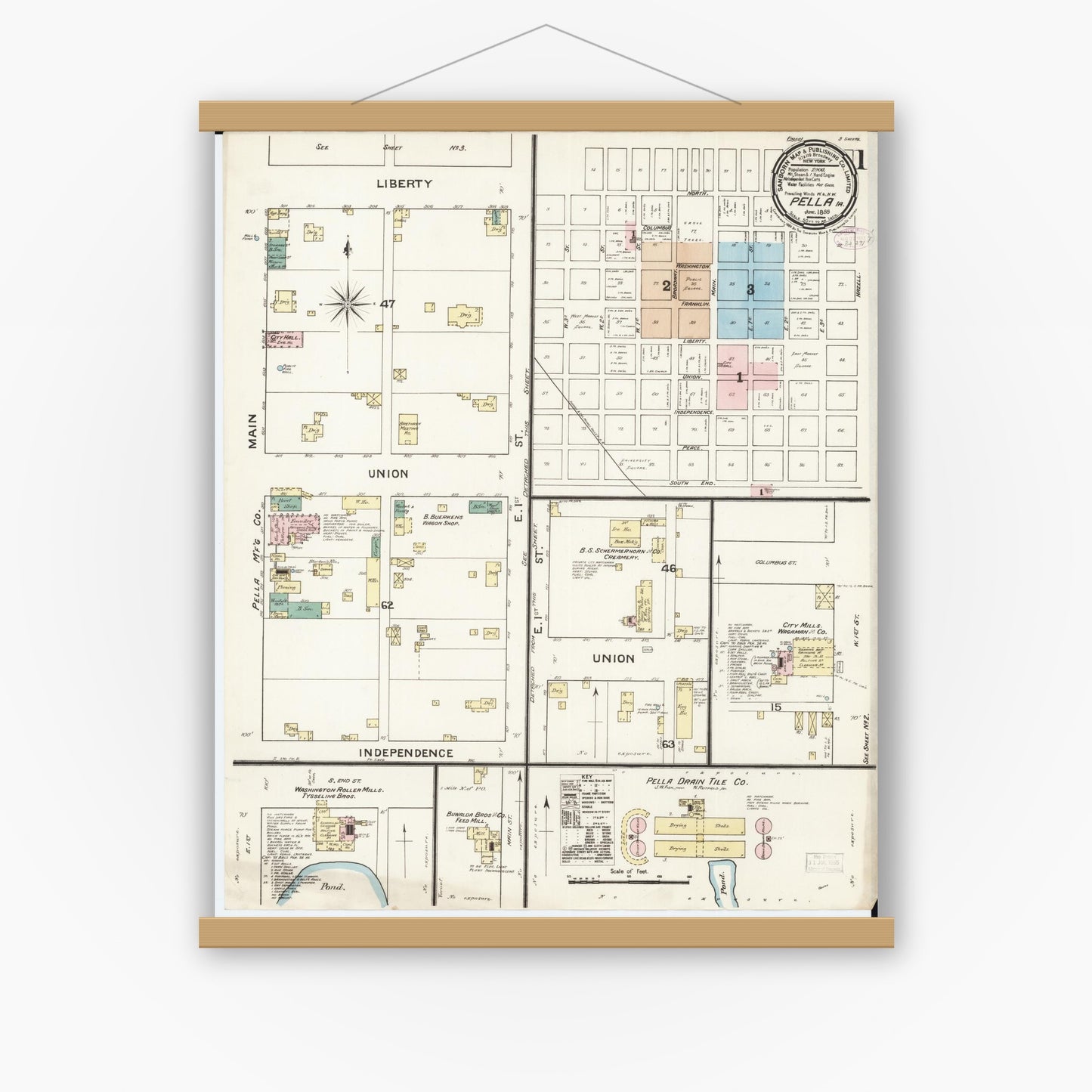 Old map wall art mockup — magnetic wood frame on white wall — Sanborn Fire Insurance Map from Pella, Marion County, Iowa (1888), Sheet #0001
