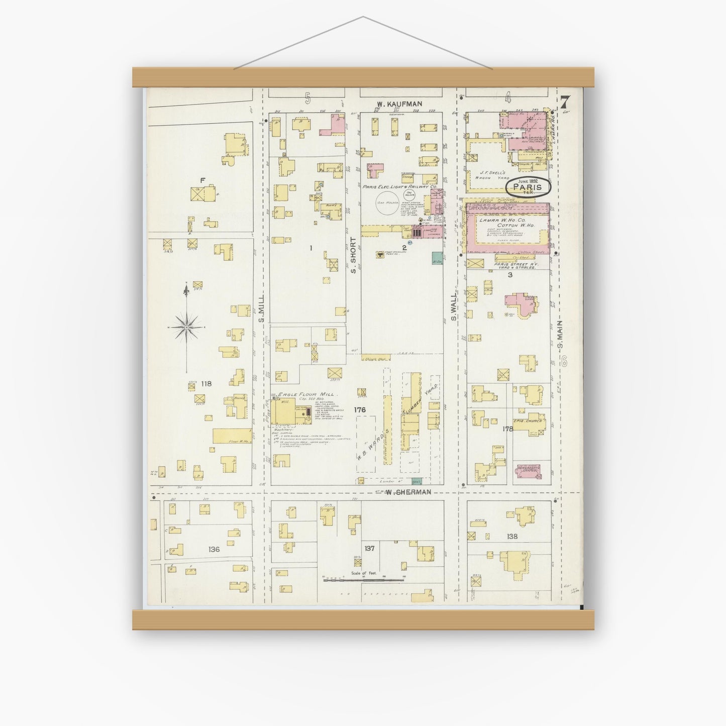 Old map wall art mockup — magnetic wood frame on white wall — Sanborn Fire Insurance Map from Paris, Lamar County, Texas (1892), Sheet #0007