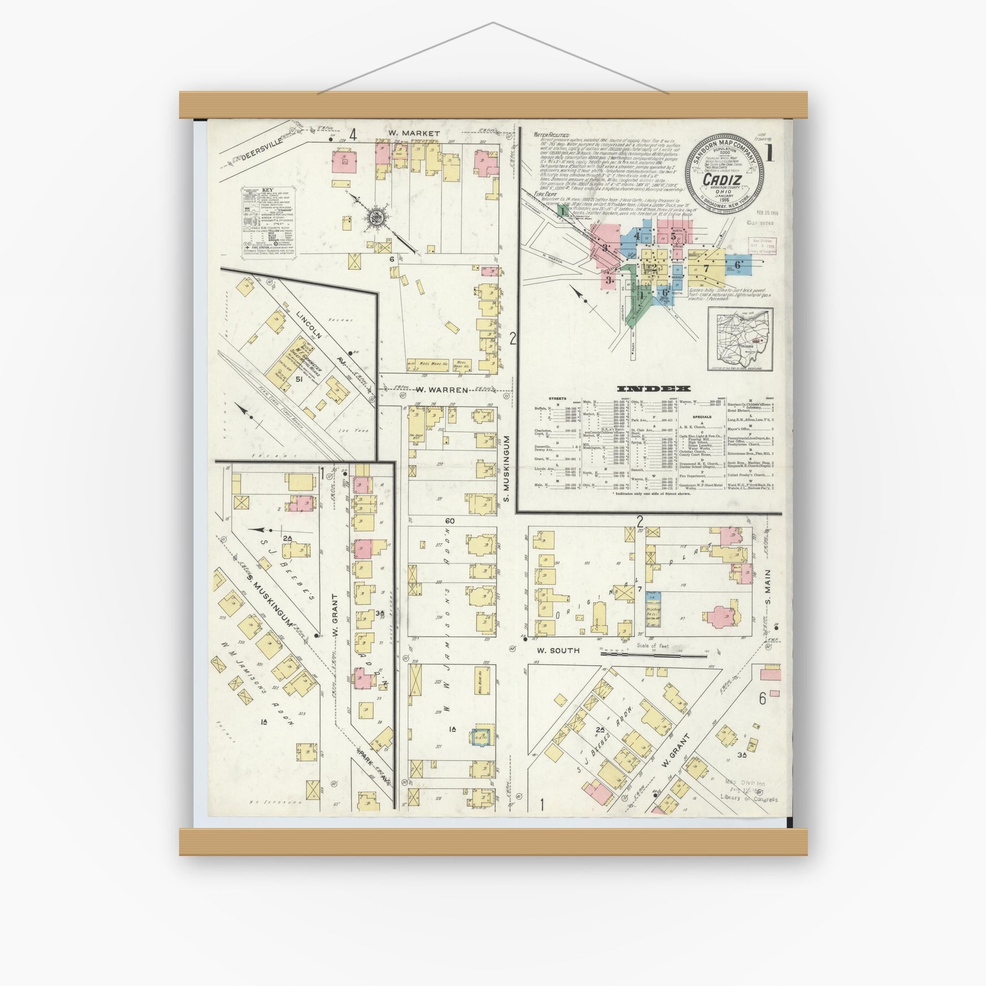 Old map wall art mockup — magnetic wood frame on white wall — Sanborn Fire Insurance Map from Cadiz, Harrison County, Ohio (1916) - Complete Map Set