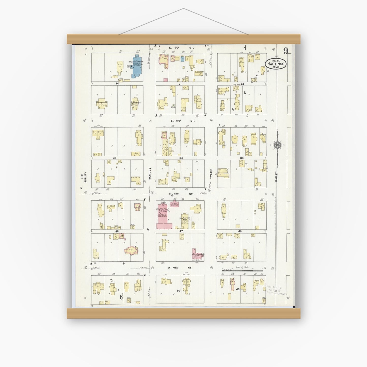 Old map wall art mockup — magnetic wood frame on white wall — Sanborn Fire Insurance Map from Hastings, Dakota County, Minnesota (1910), Sheet #0009