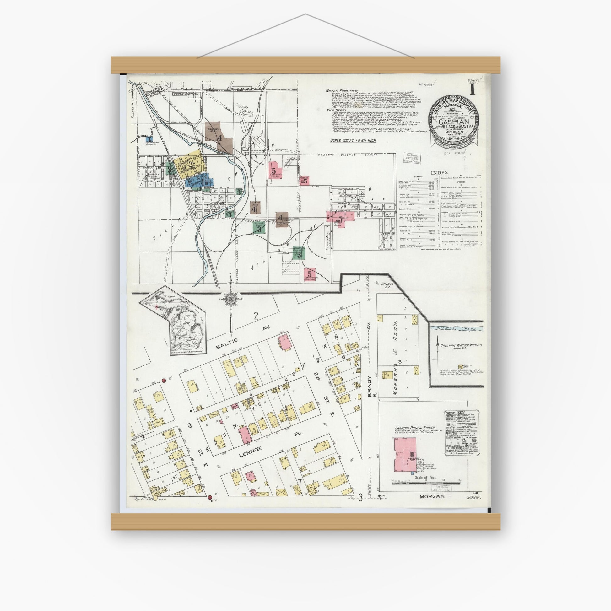 Old map wall art mockup — magnetic wood frame on white wall — Sanborn Fire Insurance Map from Caspian, Iron County, Michigan (1922), Sheet #0001