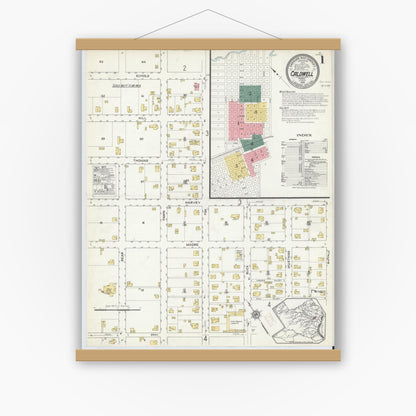 Old map wall art mockup — magnetic wood frame on white wall — Sanborn Fire Insurance Map from Caldwell, Burleson County, Texas (1915), Sheet #0001