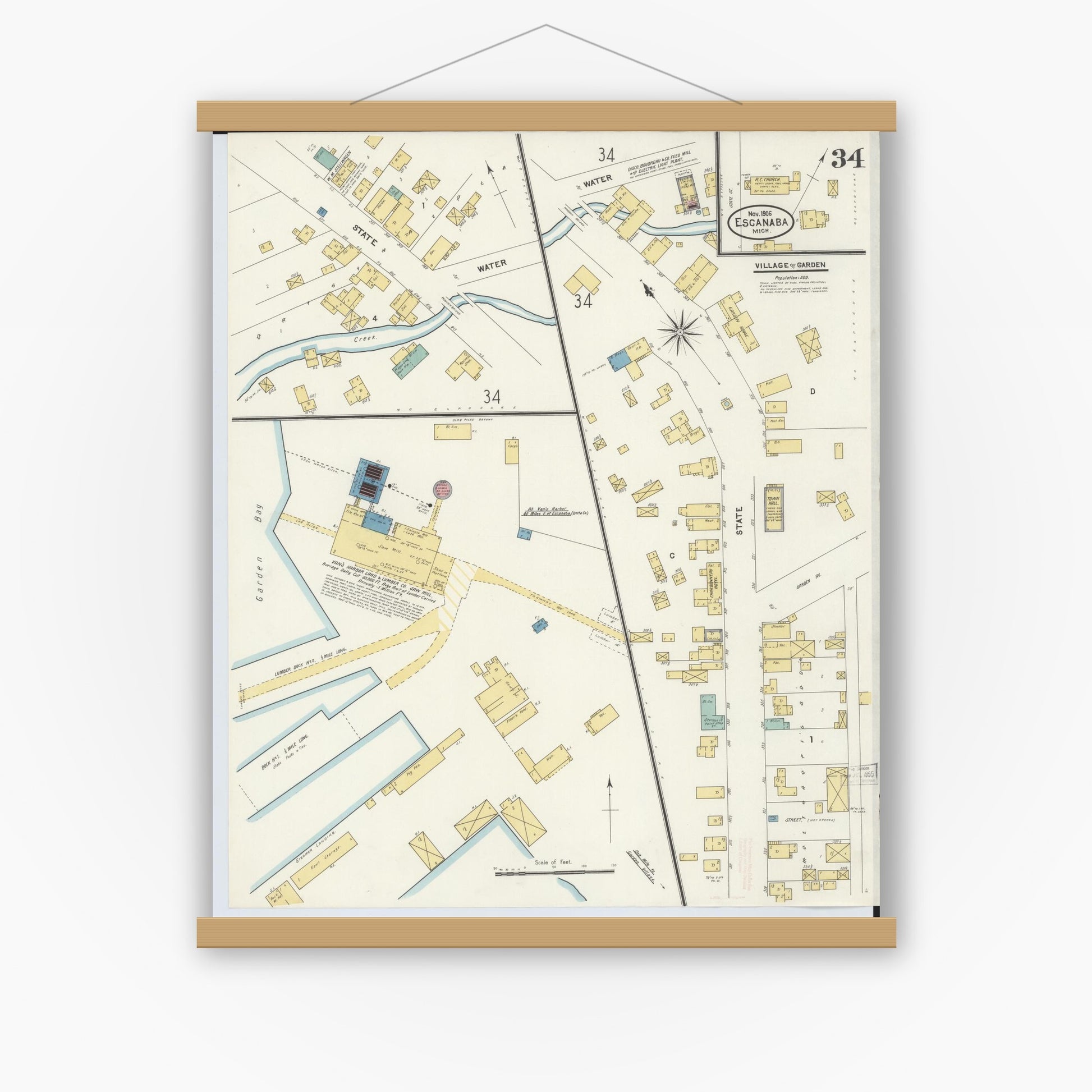 Old map wall art mockup — magnetic wood frame on white wall — Sanborn Fire Insurance Map from Escanaba, Delta County, Michigan (1906), Sheet #0034