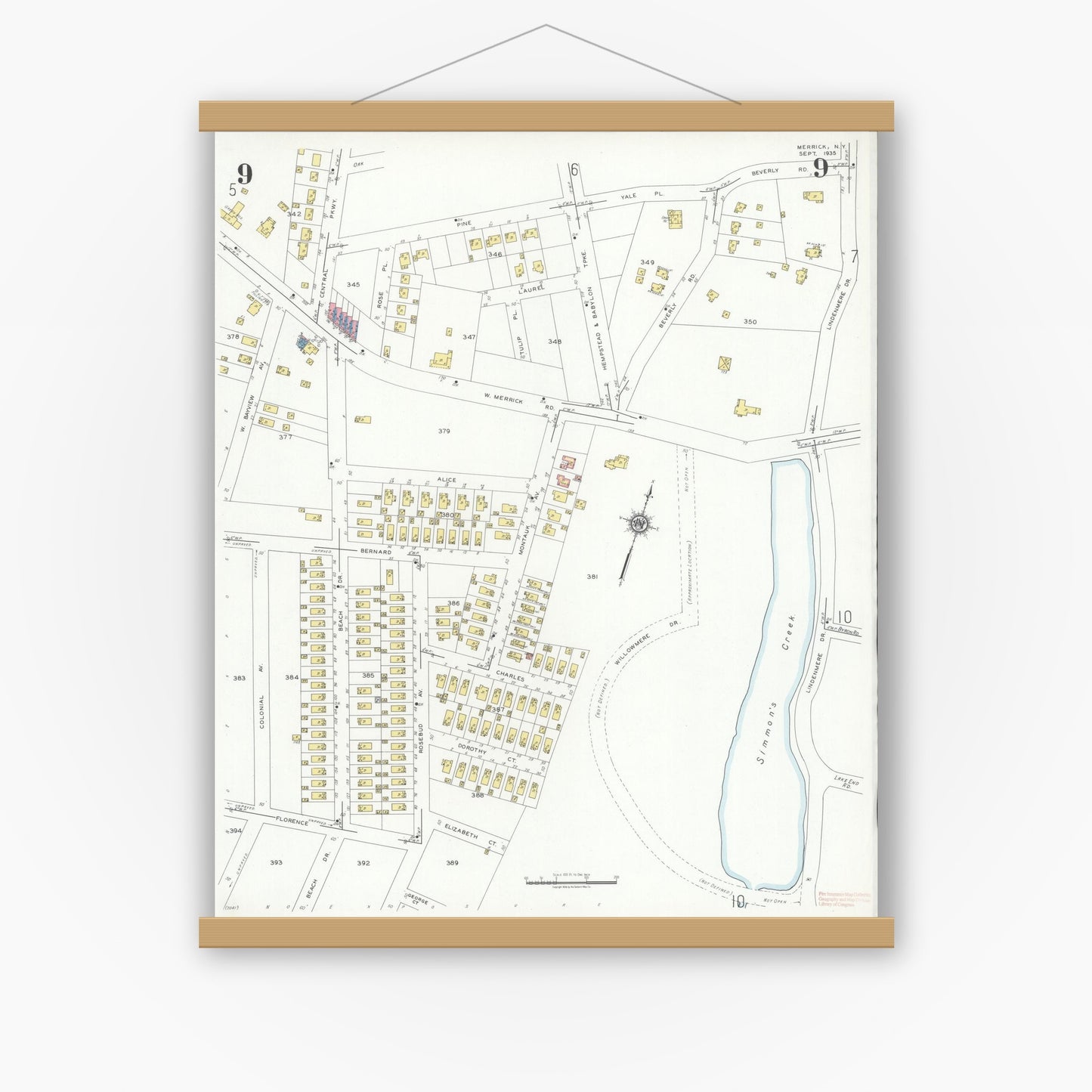 Old map wall art mockup — magnetic wood frame on white wall — Sanborn Fire Insurance Map from Merrick, Nassau County, New York (1935), Sheet #0009
