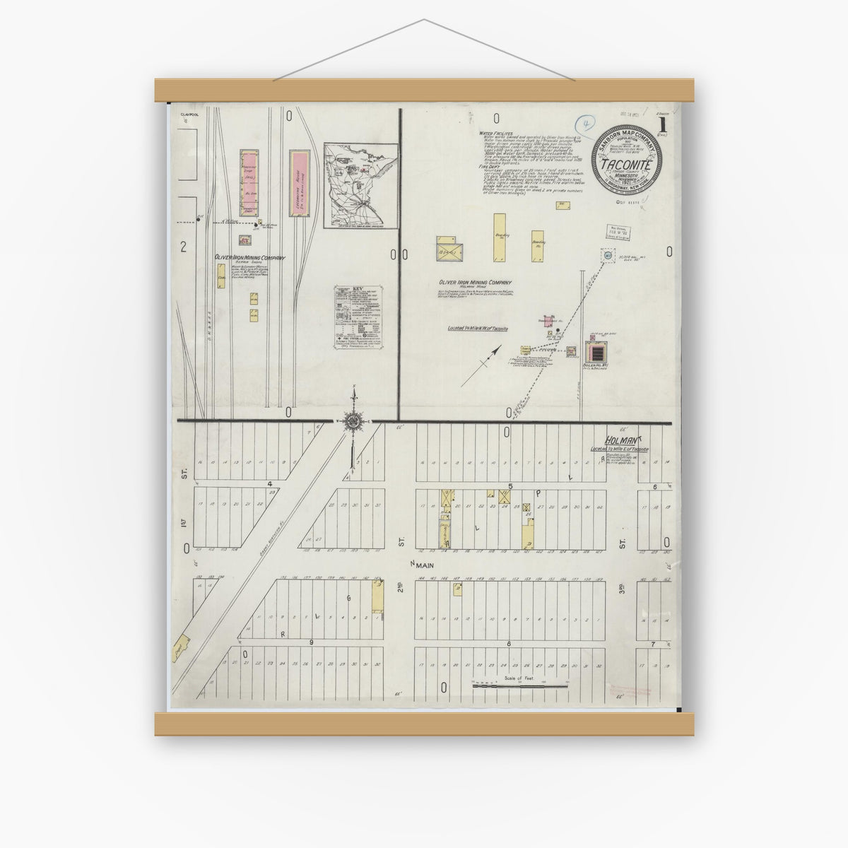 Old map wall art mockup — magnetic wood frame on white wall — Sanborn Fire Insurance Map from Taconite, Ltasca County, Minnesota (1921), Sheet #0001