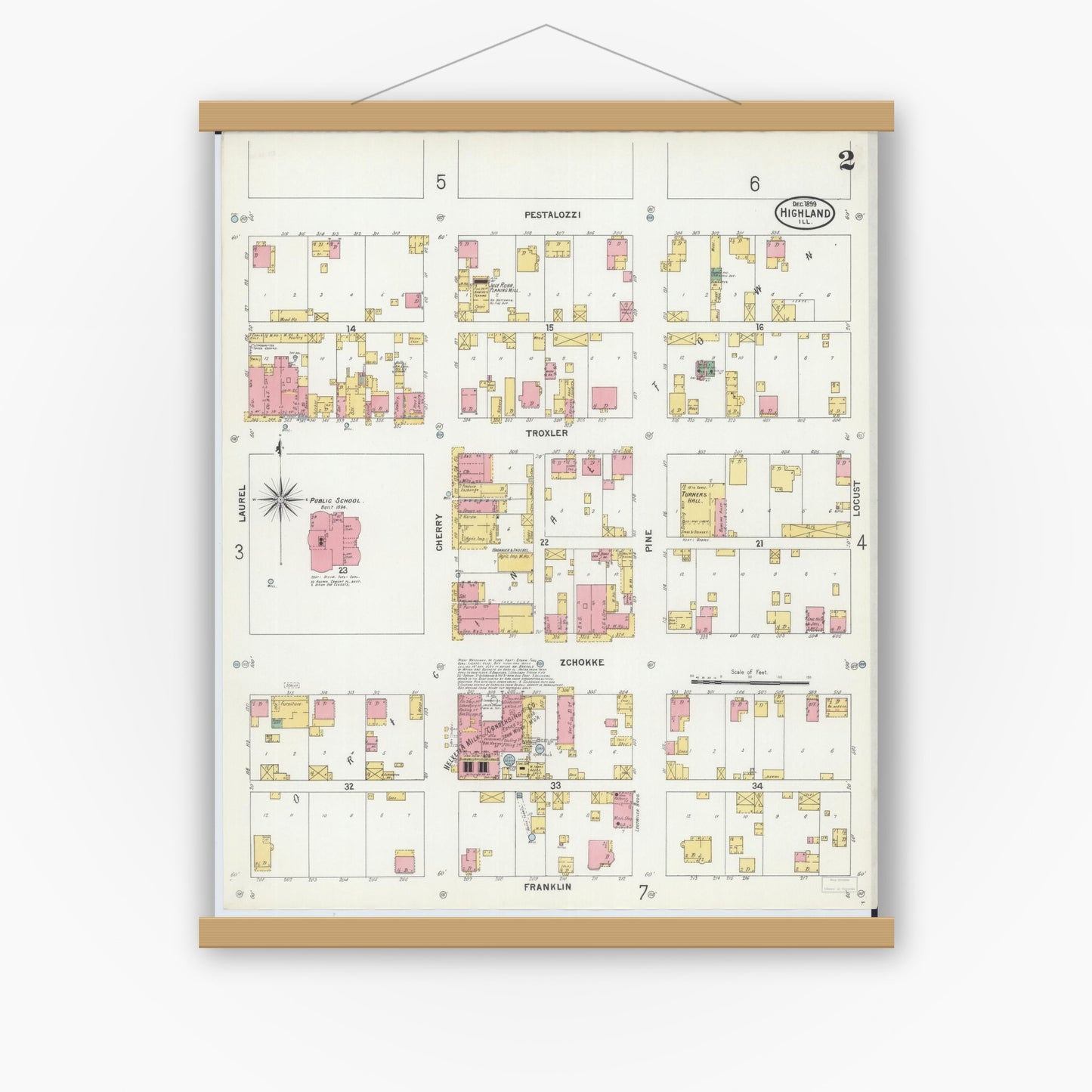 Old map wall art mockup — magnetic wood frame on white wall — Sanborn Fire Insurance Map from Highland, Madison County, Illinois (1899), Sheet #0002