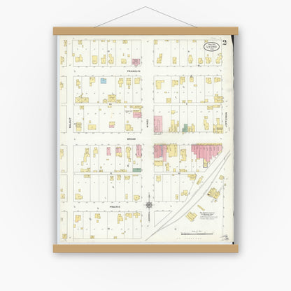 Old map wall art mockup — magnetic wood frame on white wall — Sanborn Fire Insurance Map from Lyons, Greene County, Indiana (1910), Sheet #0002
