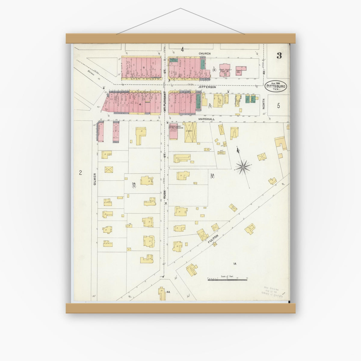 Old map wall art mockup — magnetic wood frame on white wall — Sanborn Fire Insurance Map from Pittsburg, Camp County, Texas (1906), Sheet #0003