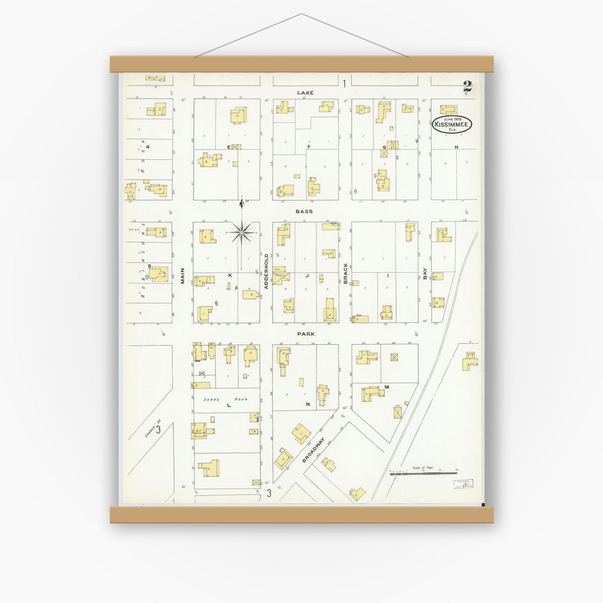 Old map wall art mockup — magnetic wood frame on white wall — Sanborn Fire Insurance Map from Kissimmee, Osceola County, Florida (1909), Sheet #0002