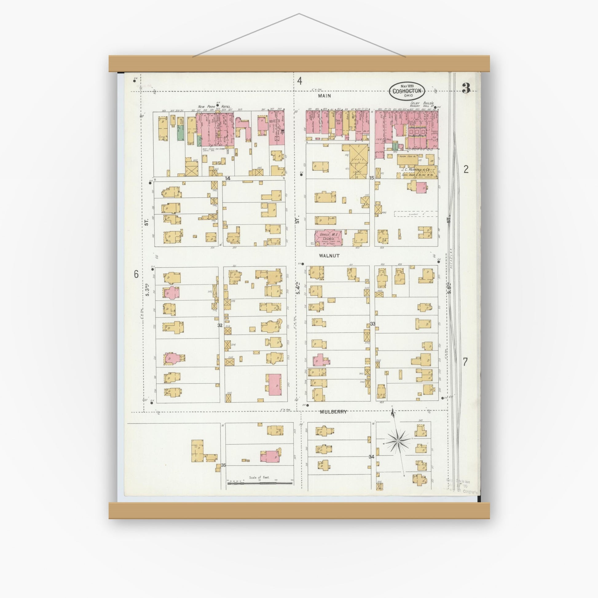 Old map wall art mockup — magnetic wood frame on white wall — Sanborn Fire Insurance Map from Coshocton, Coshocton County, Ohio (1899), Sheet #0003
