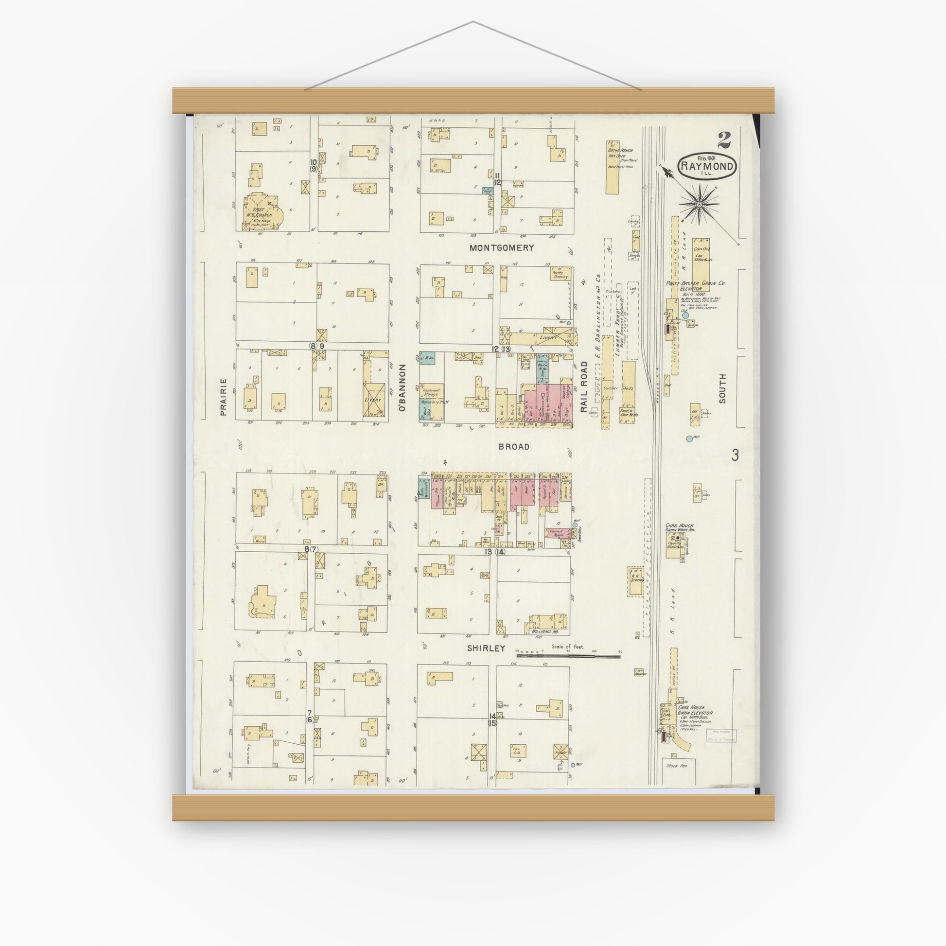 Old map wall art mockup — magnetic wood frame on white wall — Sanborn Fire Insurance Map from Raymond, Montgomery County, Illinois (1901), Sheet #0002
