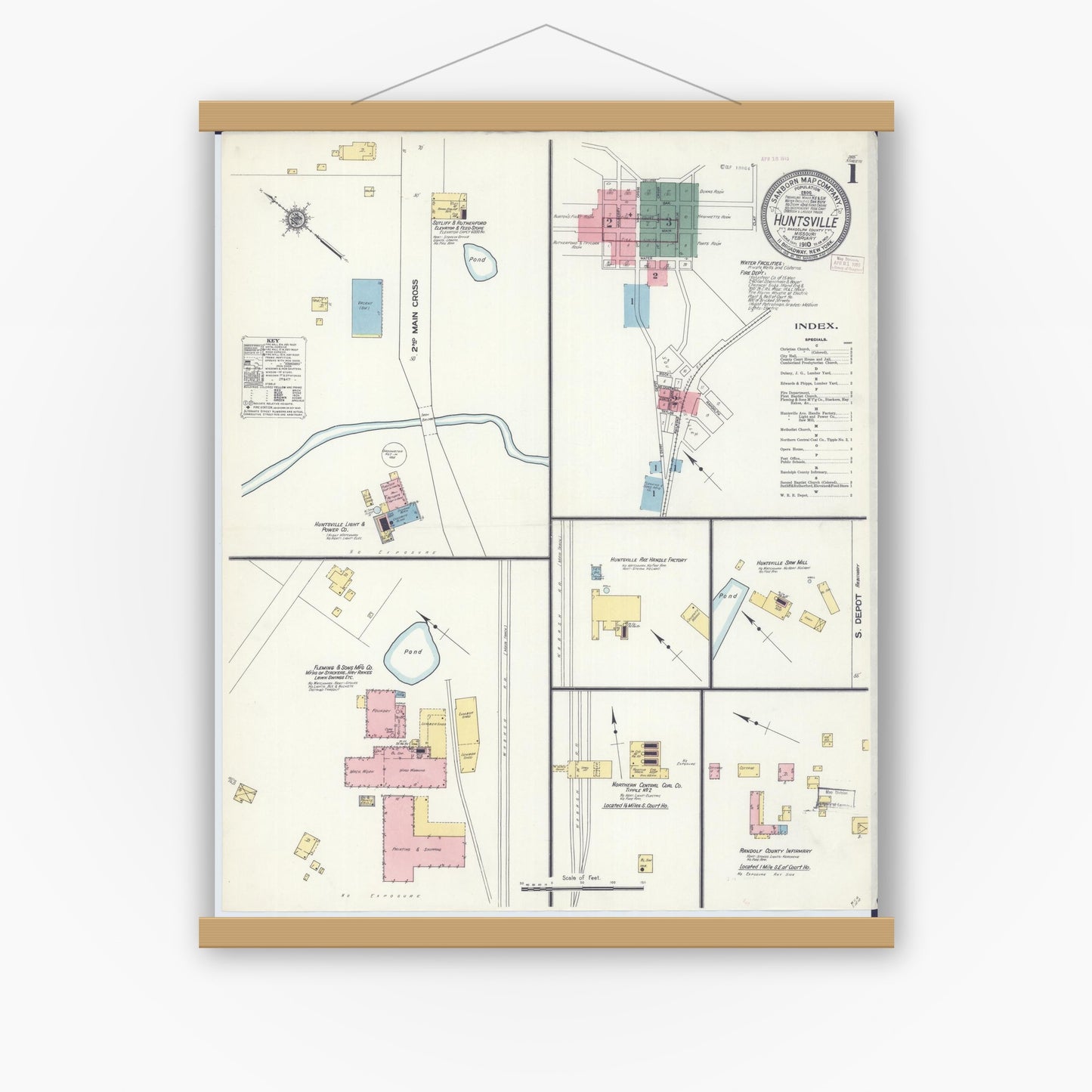 Old map wall art mockup — magnetic wood frame on white wall — Sanborn Fire Insurance Map from Huntsville, Randolph County, Missouri (1910), Sheet #0001