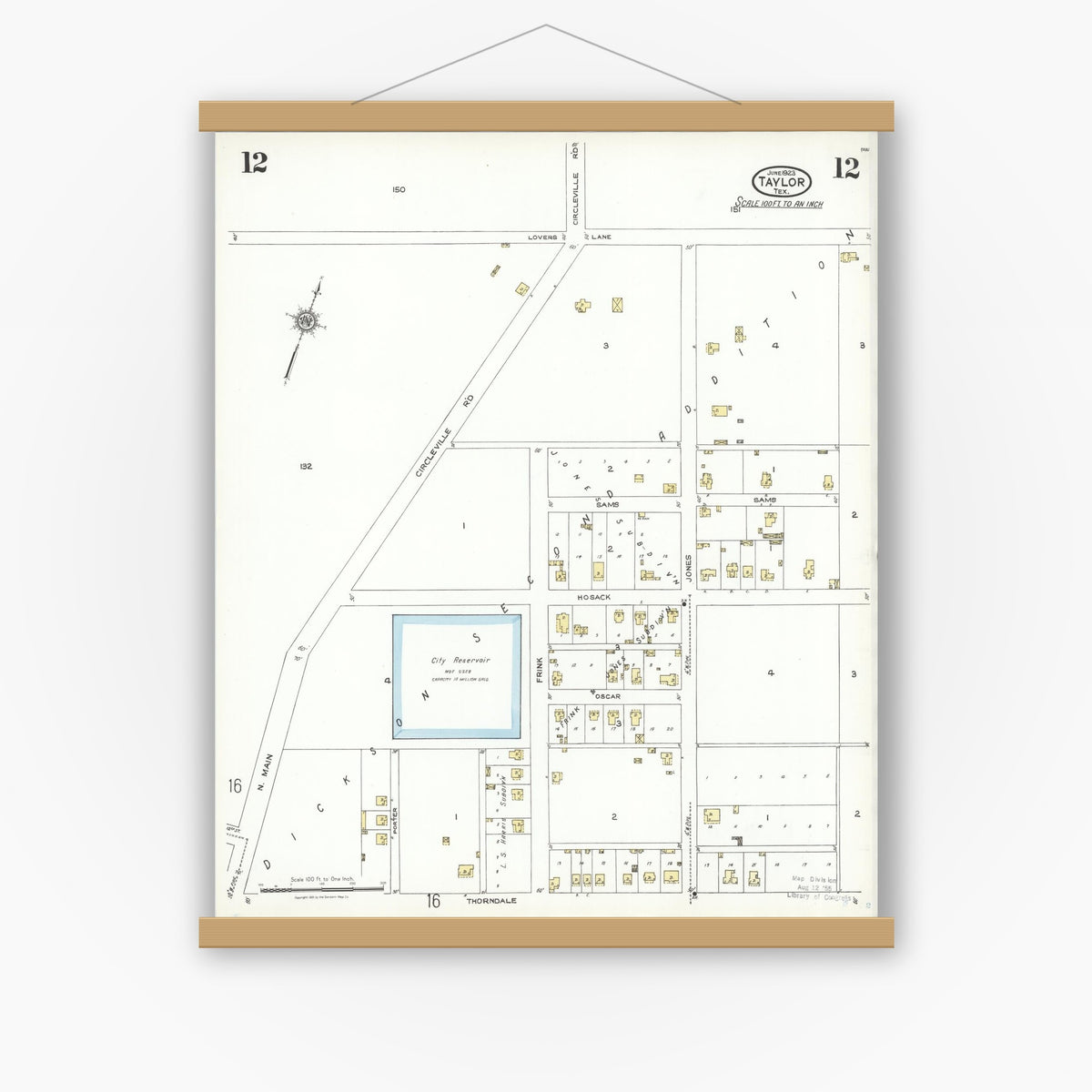 Old map wall art mockup — magnetic wood frame on white wall — Sanborn Fire Insurance Map from Taylor, Williamson County, Texas (1923), Sheet #0012