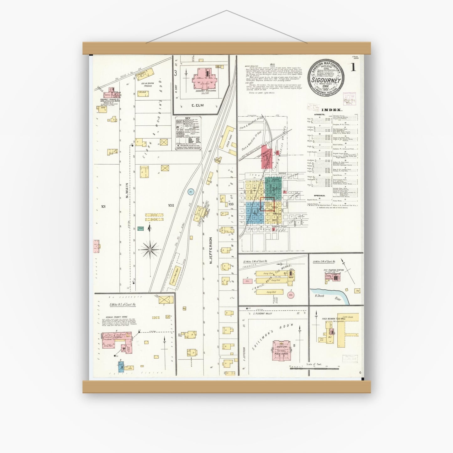 Old map wall art mockup — magnetic wood frame on white wall — Sanborn Fire Insurance Map from Sigourney, Kiokuk County, Iowa (1906) â€” Complete Set