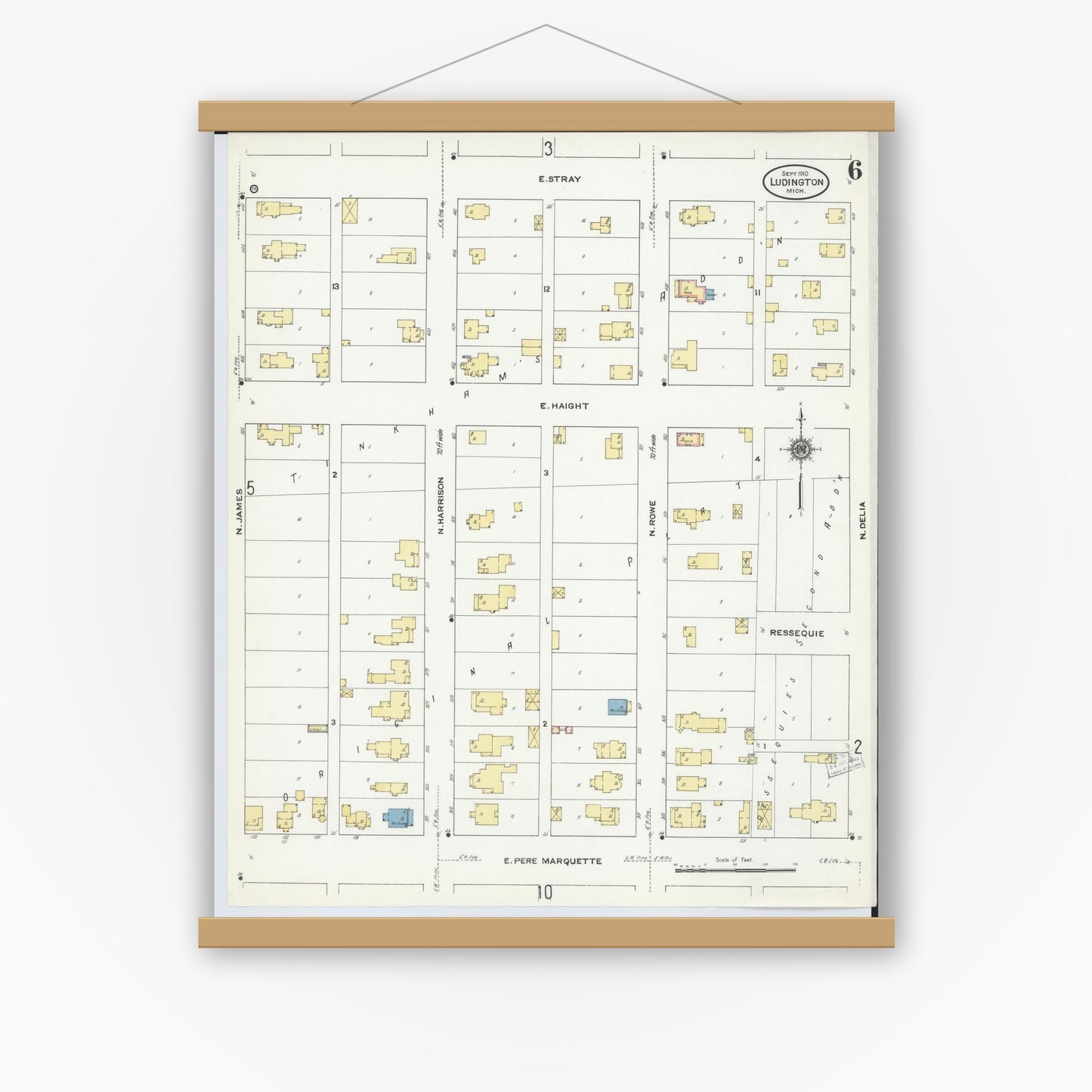 Old map wall art mockup — magnetic wood frame on white wall — Sanborn Fire Insurance Map from Ludington, Mason County, Michigan (1910), Sheet #0006