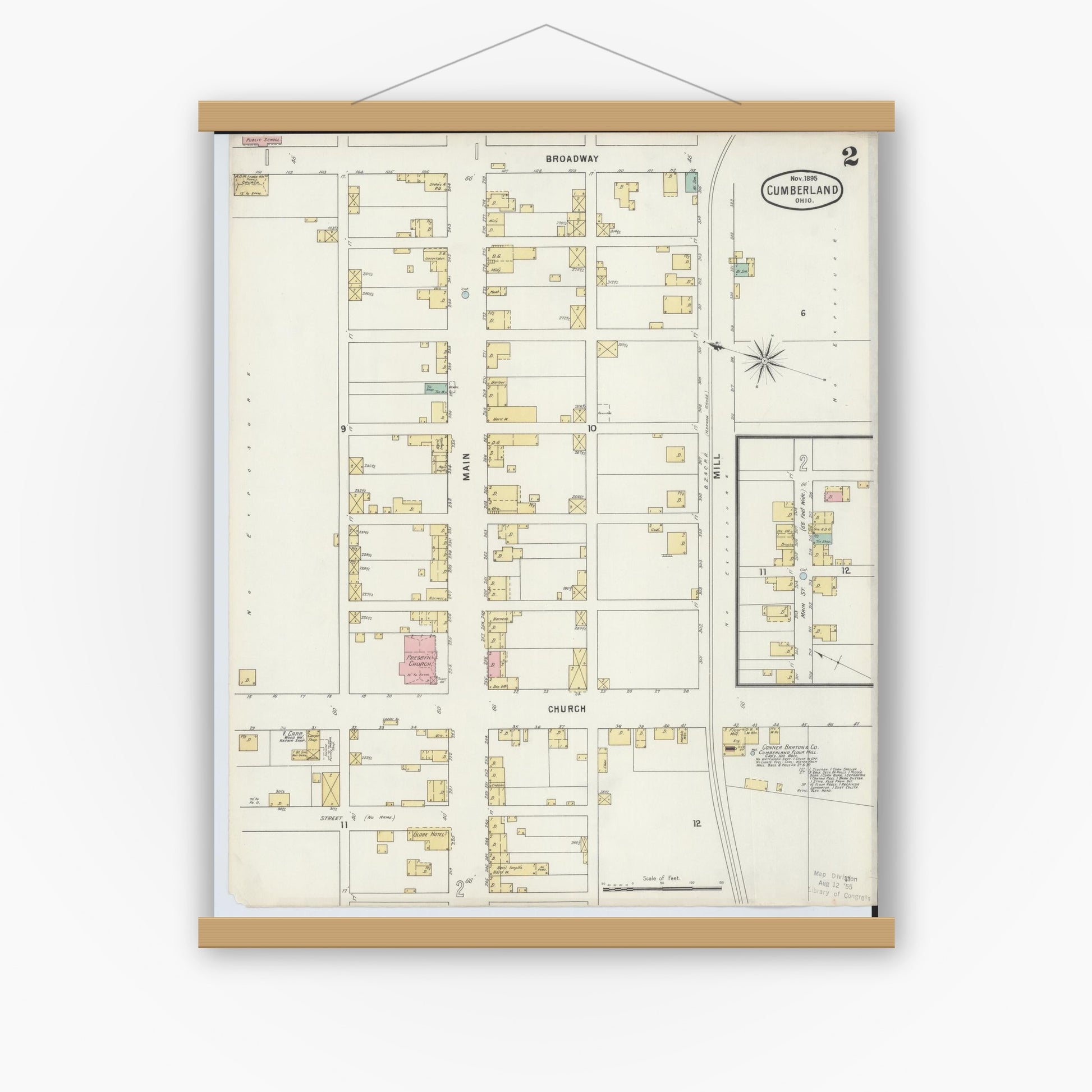 Old map wall art mockup — magnetic wood frame on white wall — Sanborn Fire Insurance Map from Cumberland, Guernsey County, Ohio (1895), Sheet #0002