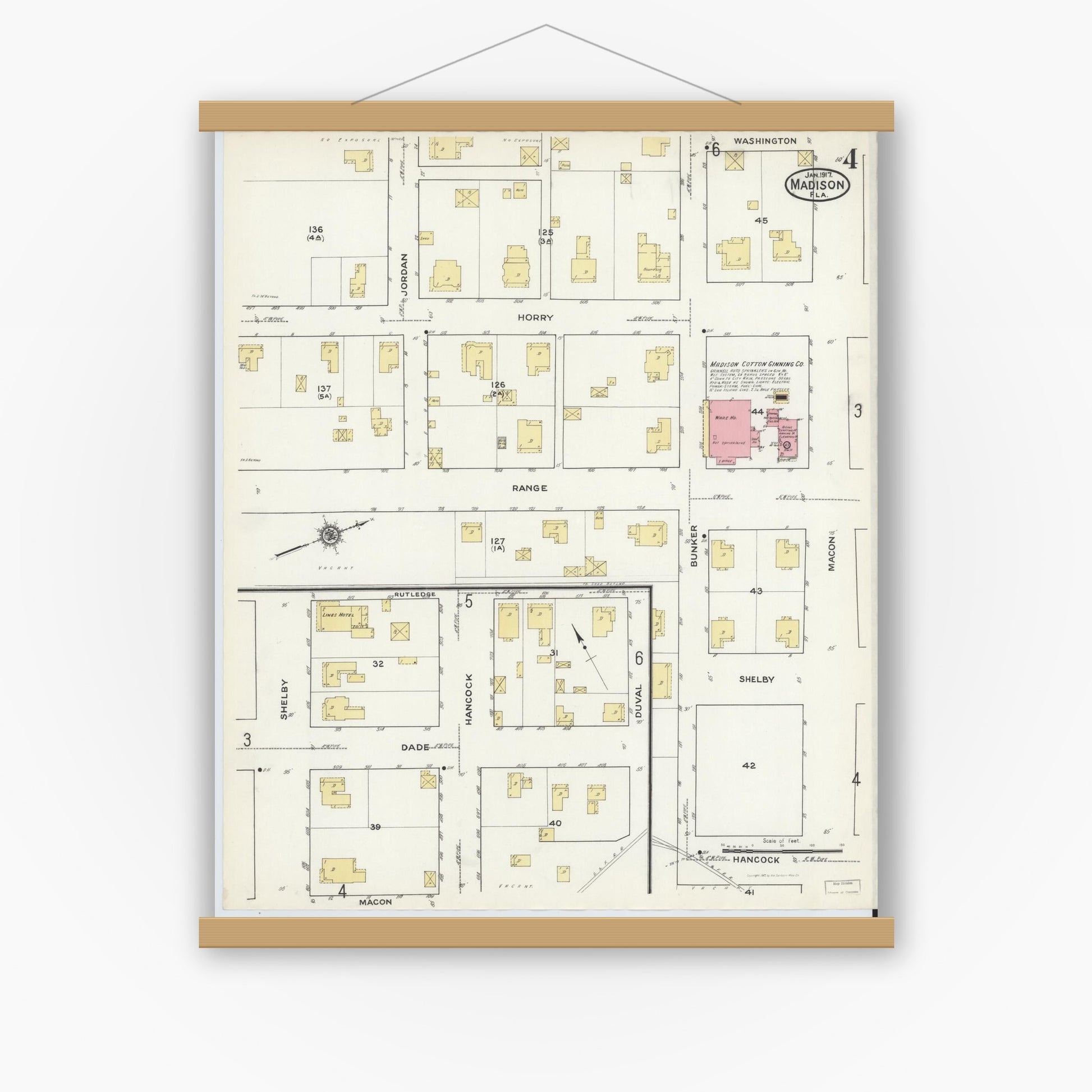 Old map wall art mockup — magnetic wood frame on white wall — Sanborn Fire Insurance Map from Madison, Madison County, Florida (1917), Sheet #0004