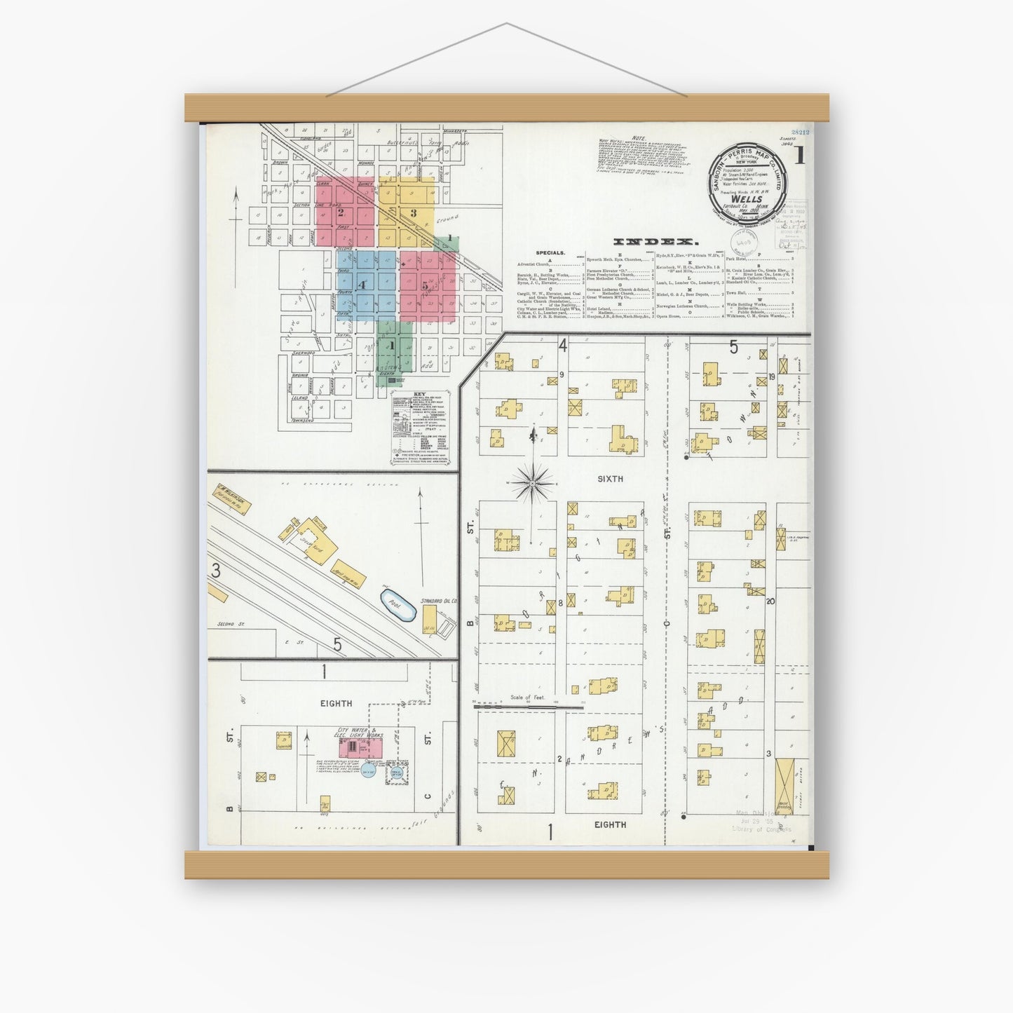 Old map wall art mockup — magnetic wood frame on white wall — Sanborn Fire Insurance Map from Wells, Faribault County, Minnesota (1900), Sheet #0001