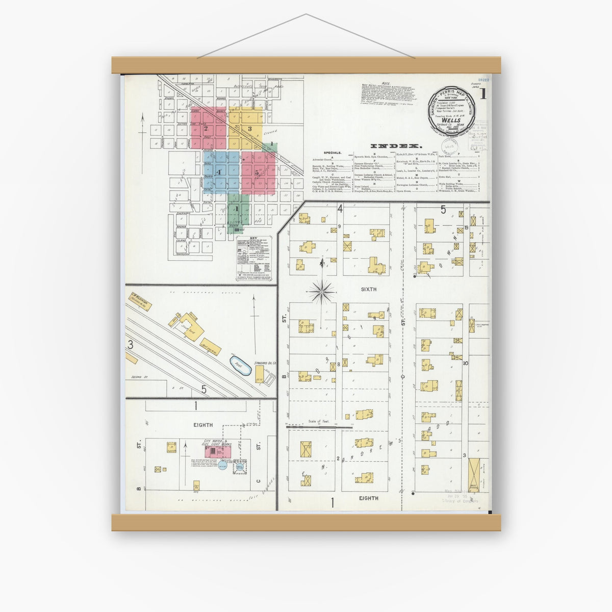 Old map wall art mockup — magnetic wood frame on white wall — Sanborn Fire Insurance Map from Wells, Faribault County, Minnesota (1900), Sheet #0001