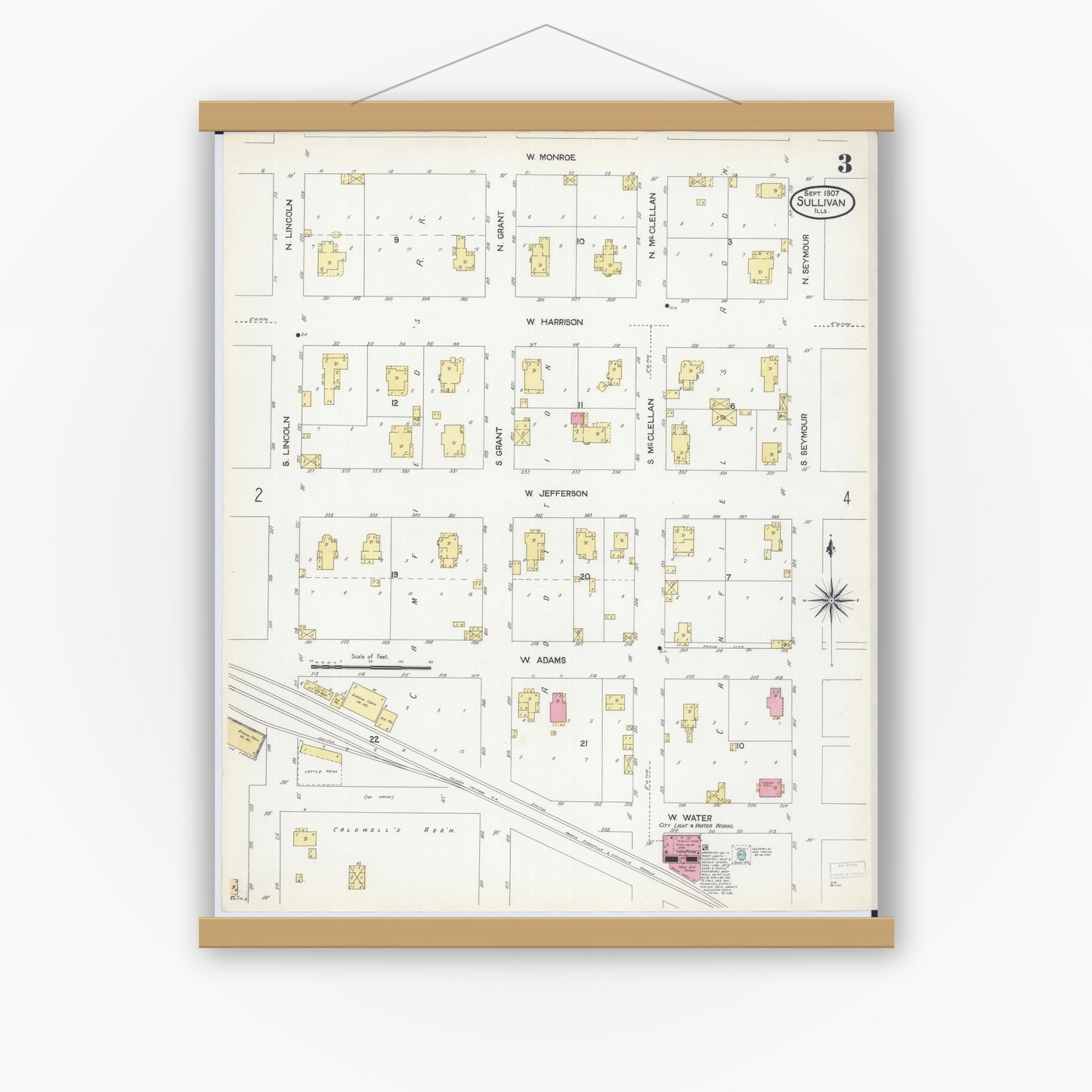 Old map wall art mockup — magnetic wood frame on white wall — Sanborn Fire Insurance Map from Sullivan, Moultrie County, Illinois (1907), Sheet #0003