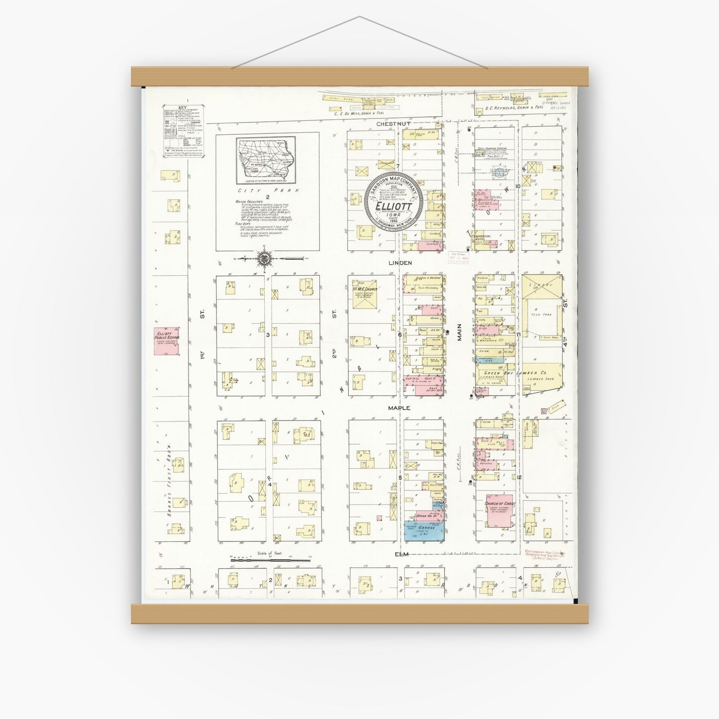Old map wall art mockup — magnetic wood frame on white wall — Sanborn Fire Insurance Map from Elliott, Montgomery County, Iowa (1914), Sheet #0001