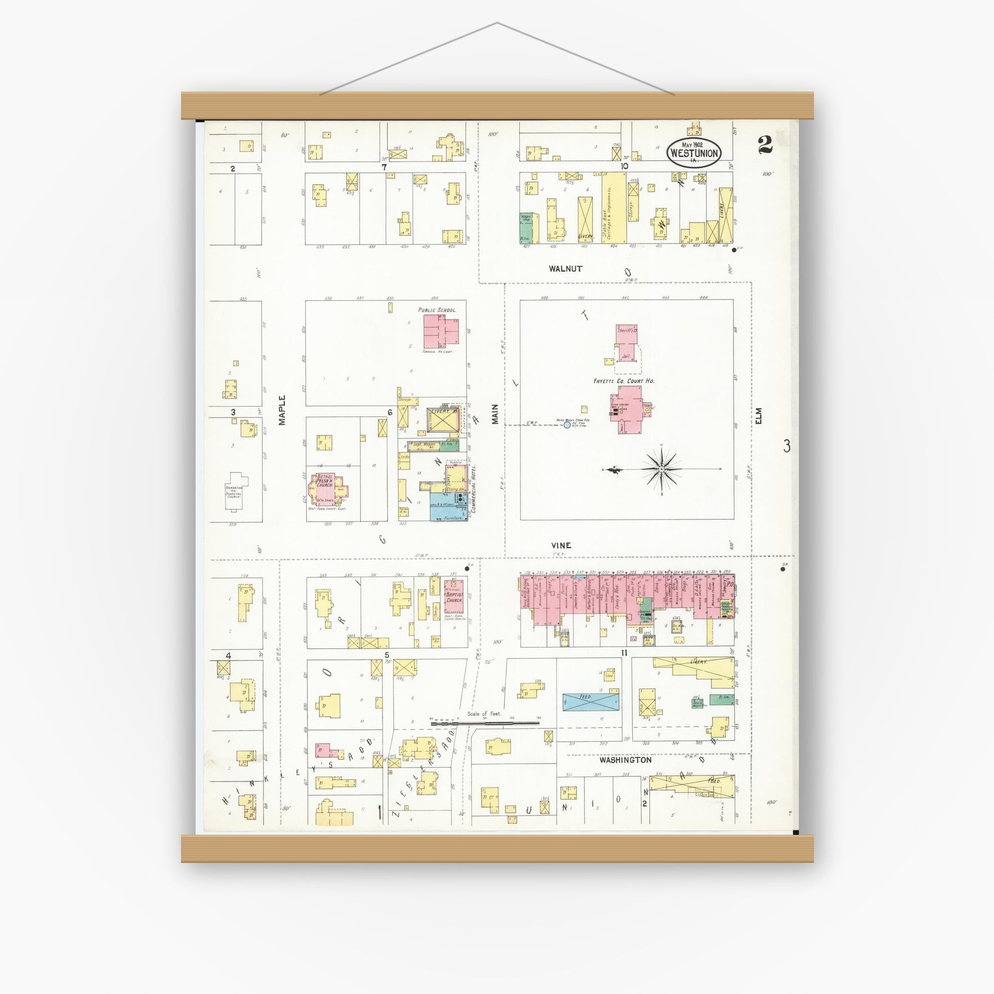 Old map wall art mockup — magnetic wood frame on white wall — Sanborn Fire Insurance Map from West Union, Fayette County, Iowa (1902), Sheet #0002