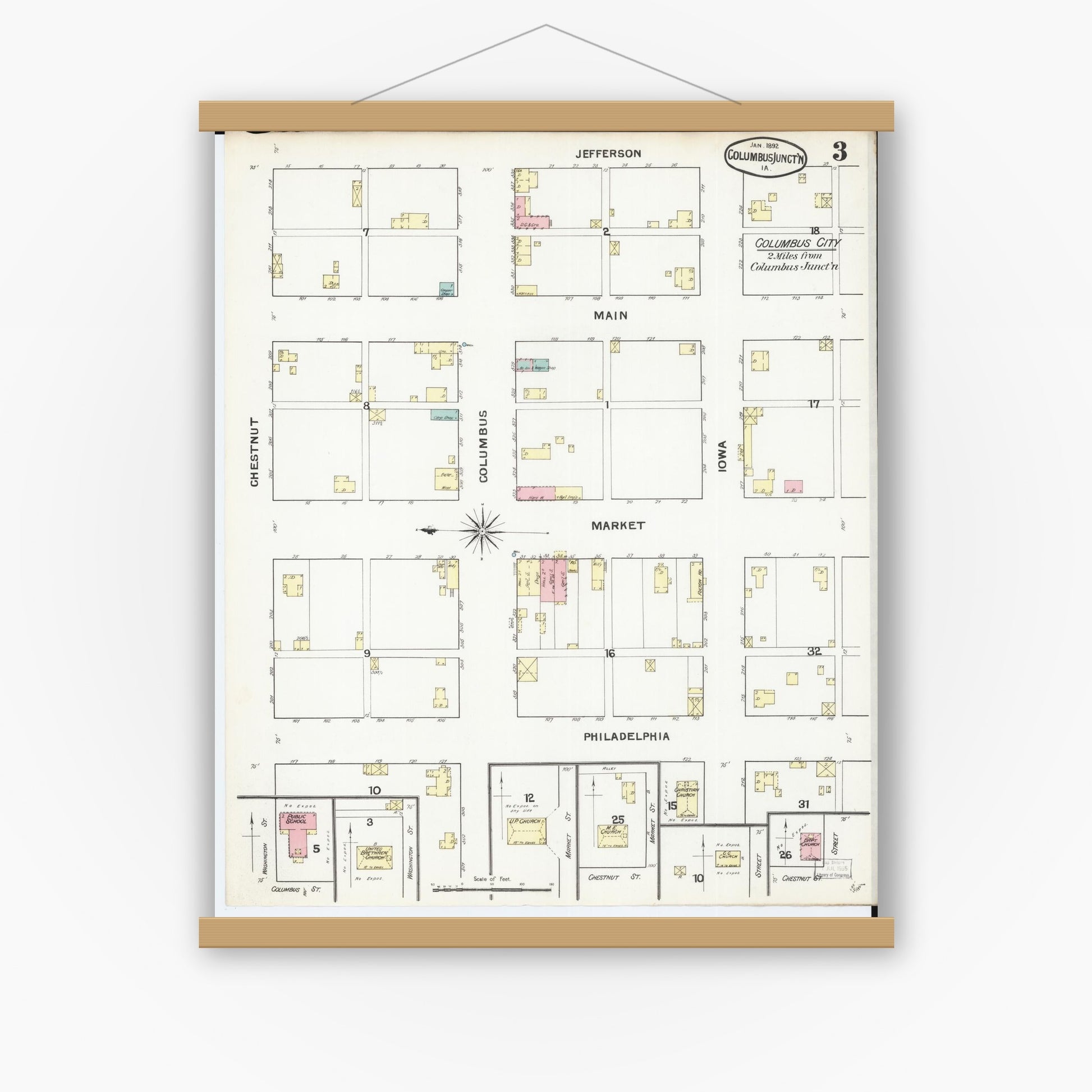 Old map wall art mockup — magnetic wood frame on white wall — Sanborn Fire Insurance Map from Columbus Junction, Louisa County, Iowa (1892), Sheet #0003