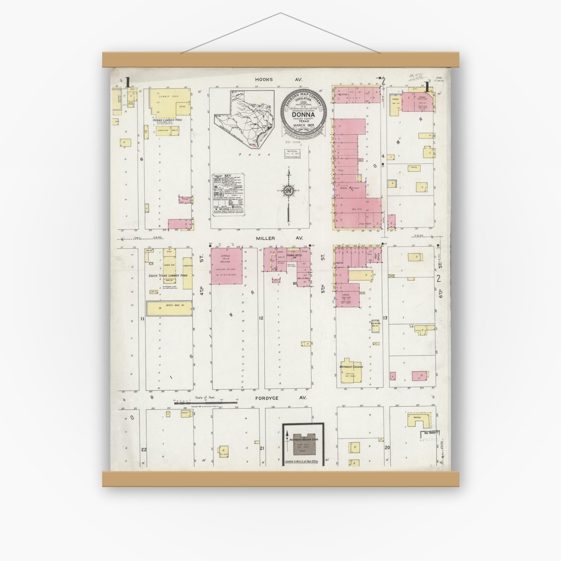 Old map wall art mockup — magnetic wood frame on white wall — Sanborn Fire Insurance Map from Donna, Hidalgo County, Texas (1925), Sheet #0001