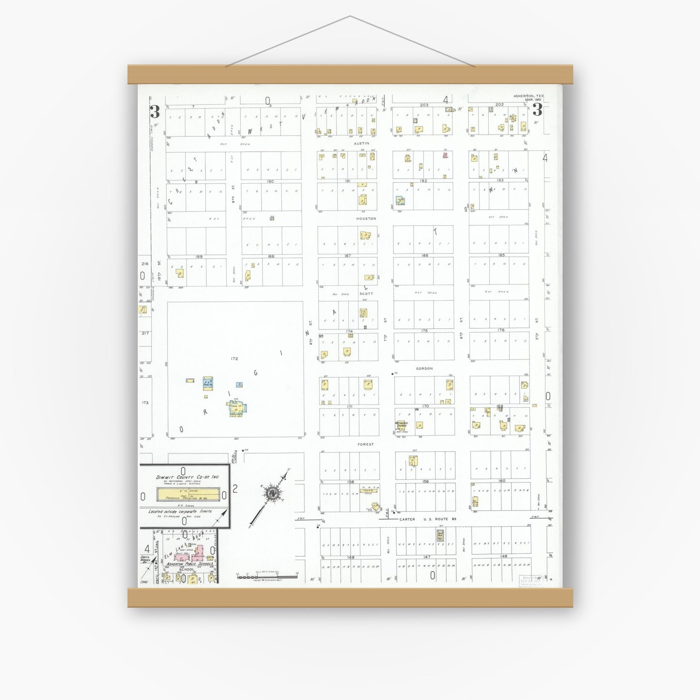 Old map wall art mockup — magnetic wood frame on white wall — Sanborn Fire Insurance Map from Asherton, Dimmit County, Texas (1951), Sheet #0003