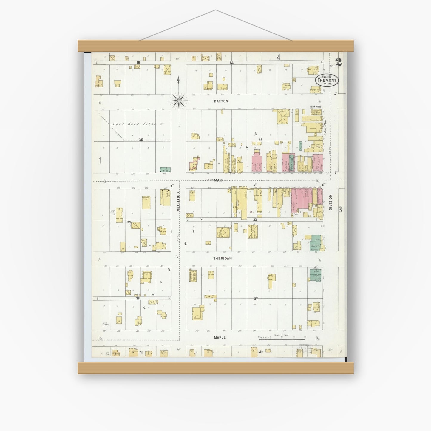 Old map wall art mockup — magnetic wood frame on white wall — Sanborn Fire Insurance Map from Fremont, Newaygo County, Michigan (1899), Sheet #0002