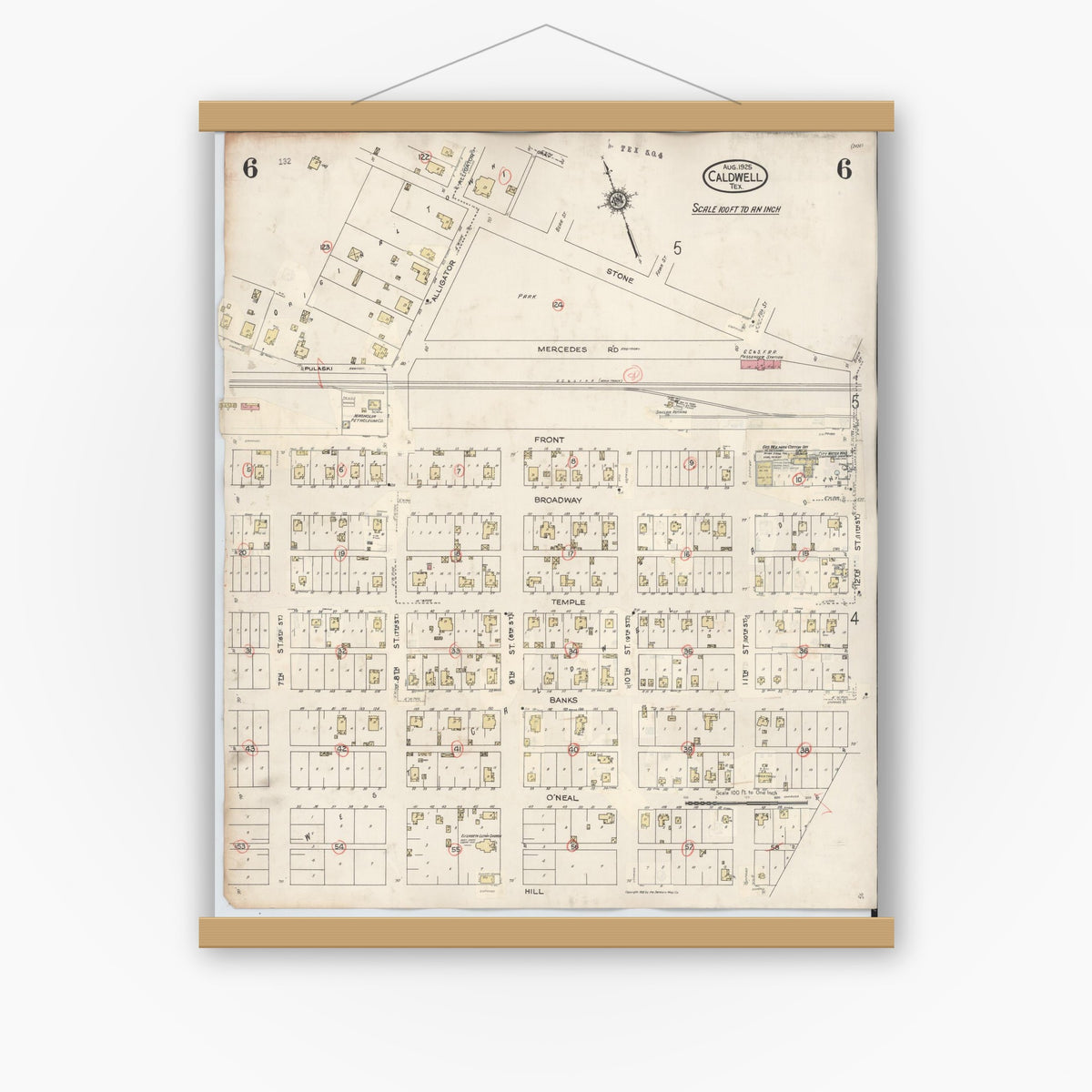 Old map wall art mockup — magnetic wood frame on white wall — Sanborn Fire Insurance Map from Caldwell, Burleson County, Texas (1943), Sheet #0006