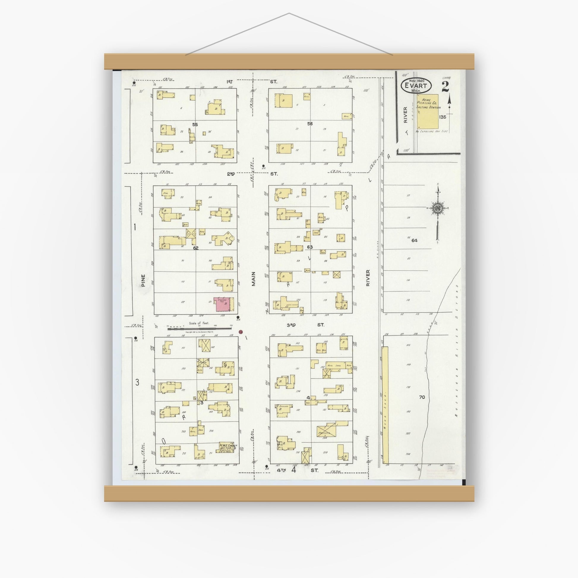 Old map wall art mockup — magnetic wood frame on white wall — Sanborn Fire Insurance Map from Evart, Osceola County, Michigan (1920), Sheet #0002