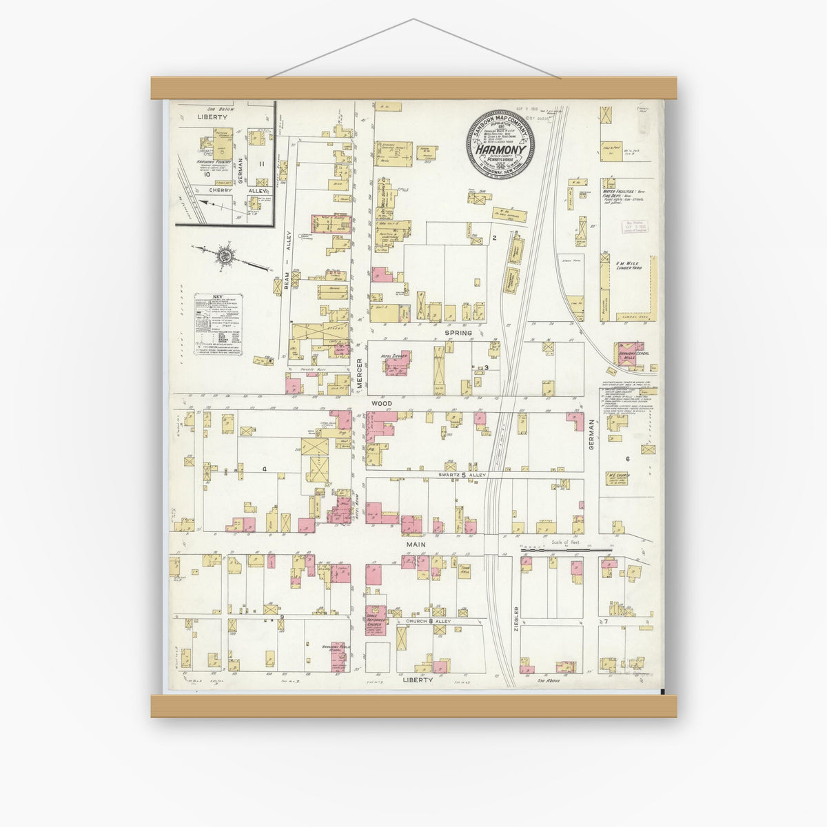 Old map wall art mockup — magnetic wood frame on white wall — Sanborn Fire Insurance Map from Harmony, Butler County, Pennsylvania (1912), Sheet #0001