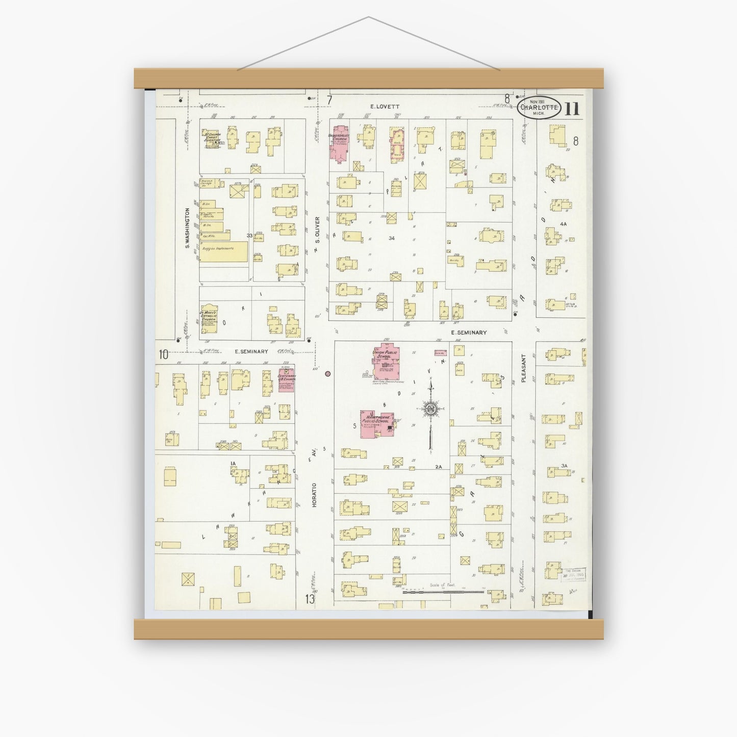 Old map wall art mockup — magnetic wood frame on white wall — Sanborn Fire Insurance Map from Charlotte, Eaton County, Michigan (1911), Sheet #0011