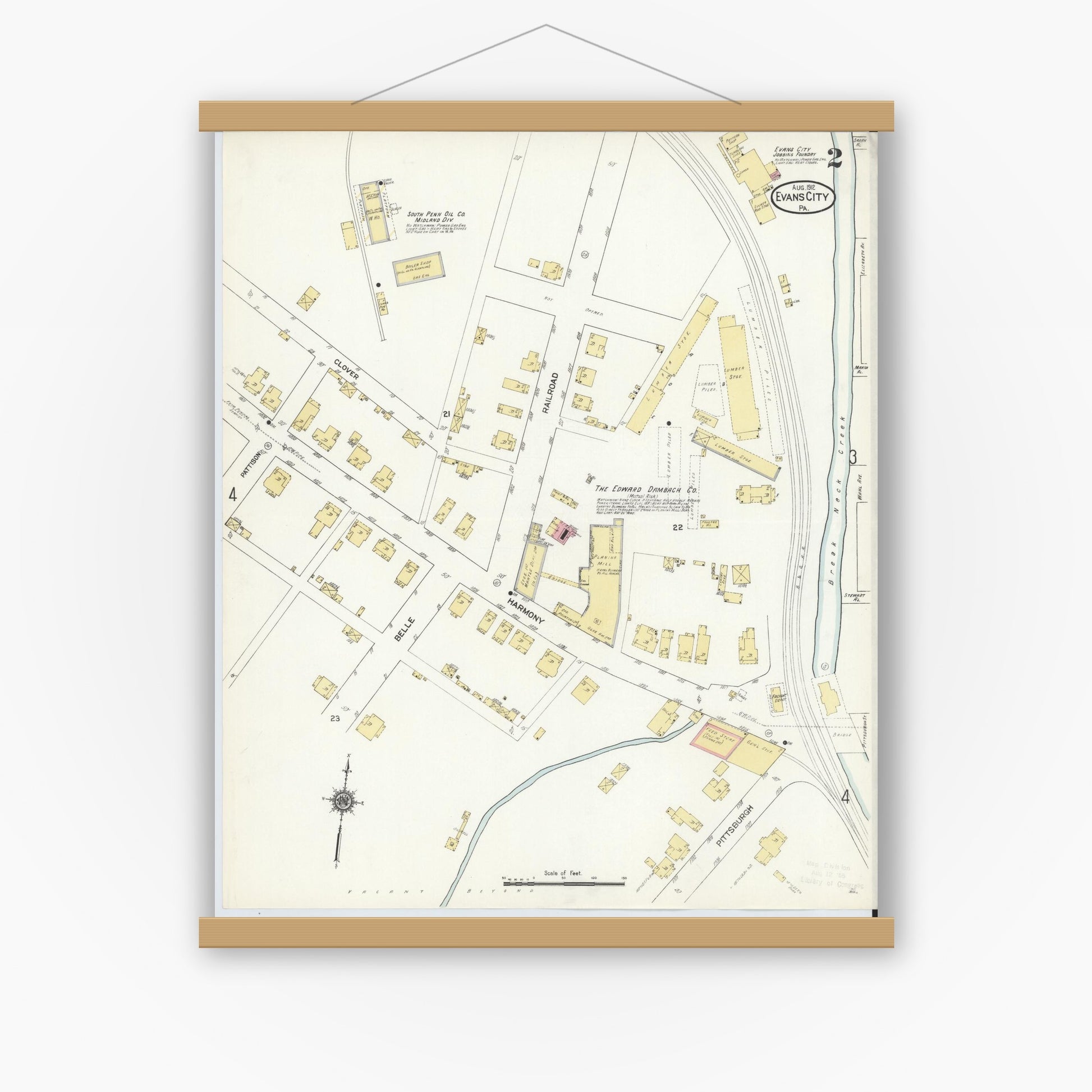 Old map wall art mockup — magnetic wood frame on white wall — Sanborn Fire Insurance Map from Evans City, Butler County, Pennsylvania (1912), Sheet #0002