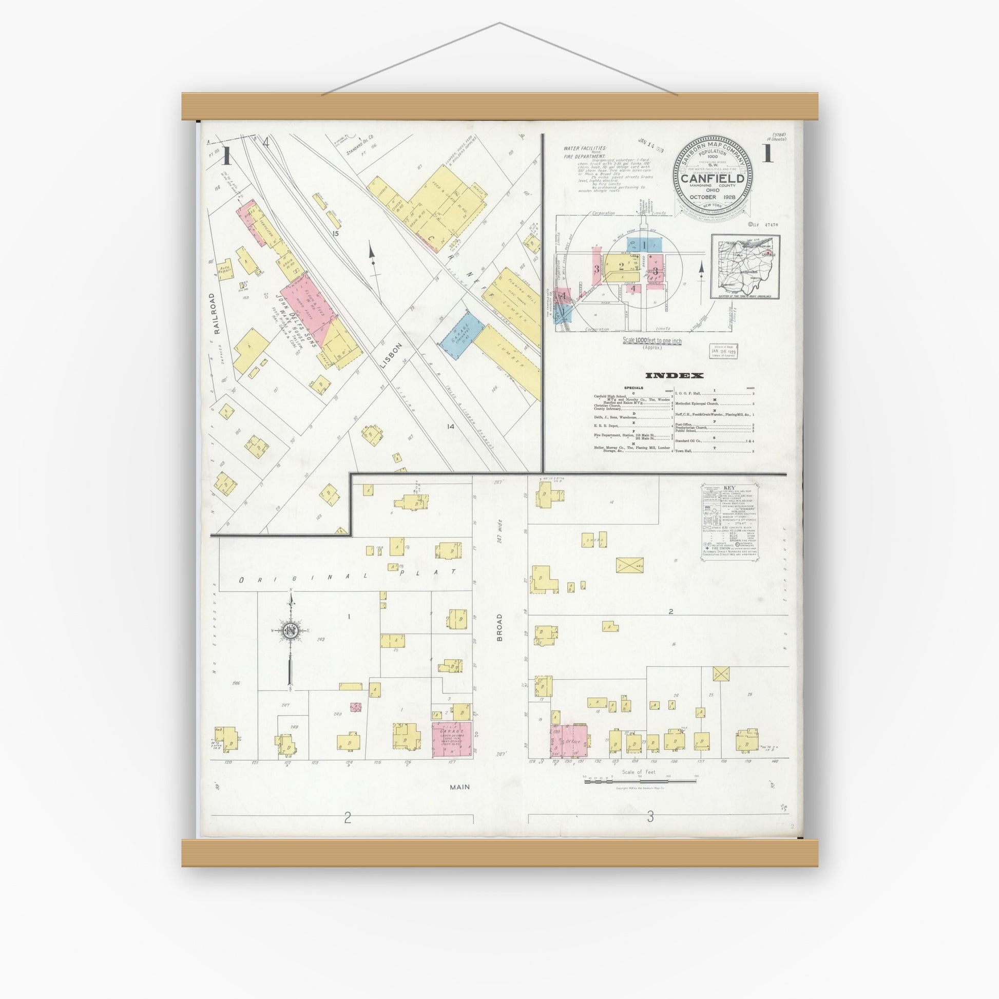 Old map wall art mockup — magnetic wood frame on white wall — Sanborn Fire Insurance Map from Canfield, Mahoning County, Ohio (1928), Sheet #0001